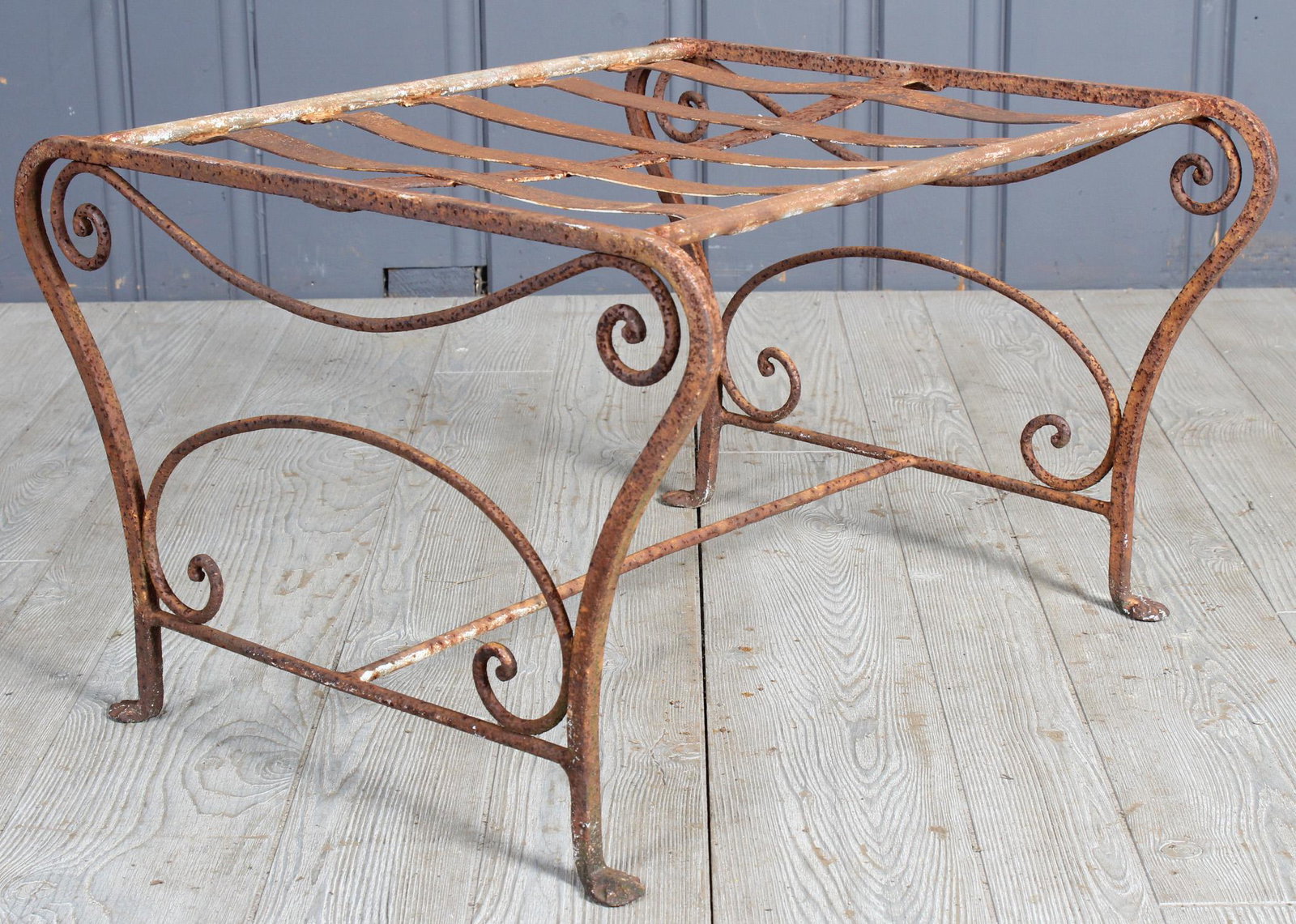 Wrought Iron Ottoman: Wrought Iron Ottoman, scroll design. Size: 14.5" H x 24" W x 22" D
