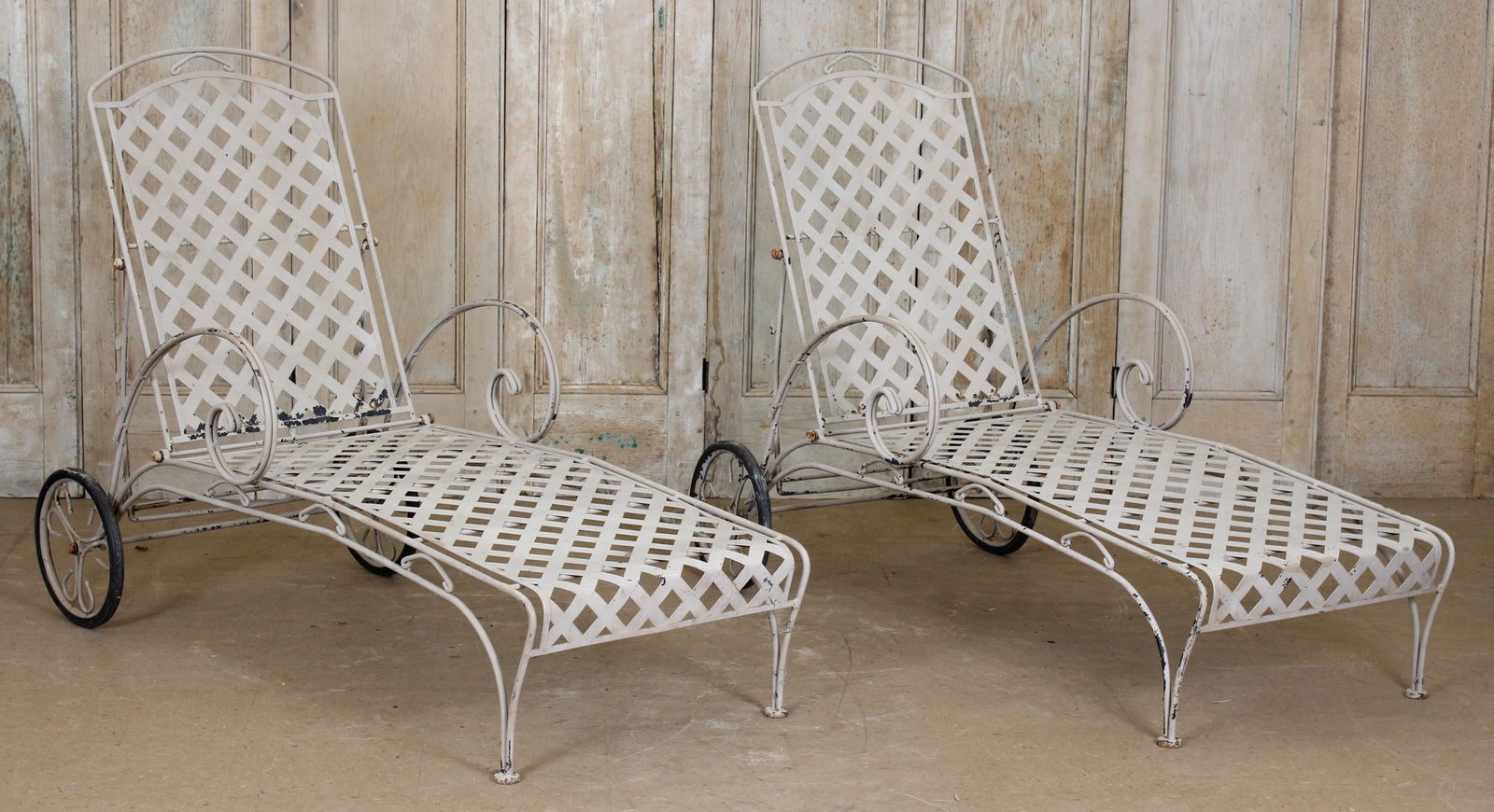 Pair Wrought Iron Deck Chaises with Metal Lattice: A good pair of vintage wrought iron garden chaise lounge. Size: 43" H x 28.5" W x 59.5" D