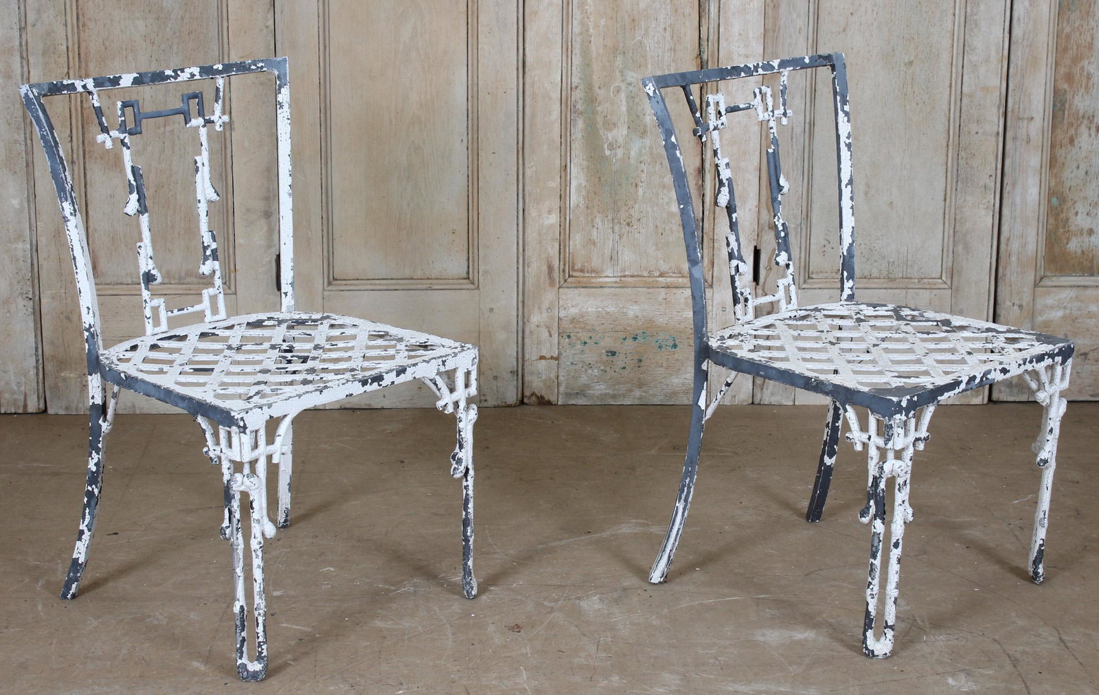 Pair Chinese Chippendale Metal Faux Bamboo Chairs: Interesting pair of Chinese Chippendale style cast metal garden chairs having faux bamboo decoration. Size: 31.5" H x 19" W x 18.5" D (NHJ 35)