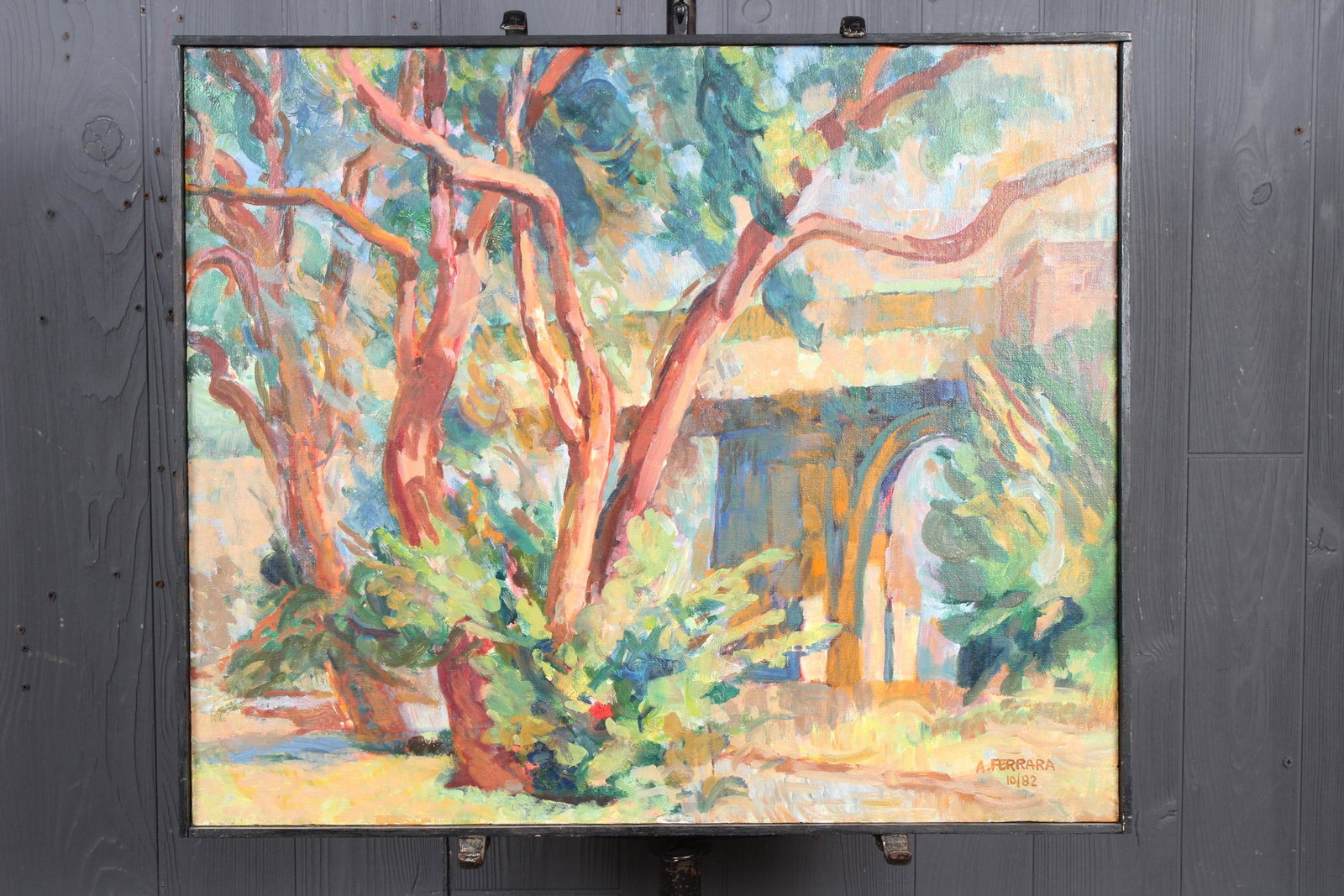 Anthony A. Ferrara Dreamy Bridge Painting: Anthony A. Ferrara Dreamy Bridge Painting, (American, 1930 - 2012), oil on canvas, signed and dated lower right A. Ferrara 10/82. Size: Framed: 21.5" H x 25.5" W x 1" D; Sight: 21" H x 25" W.