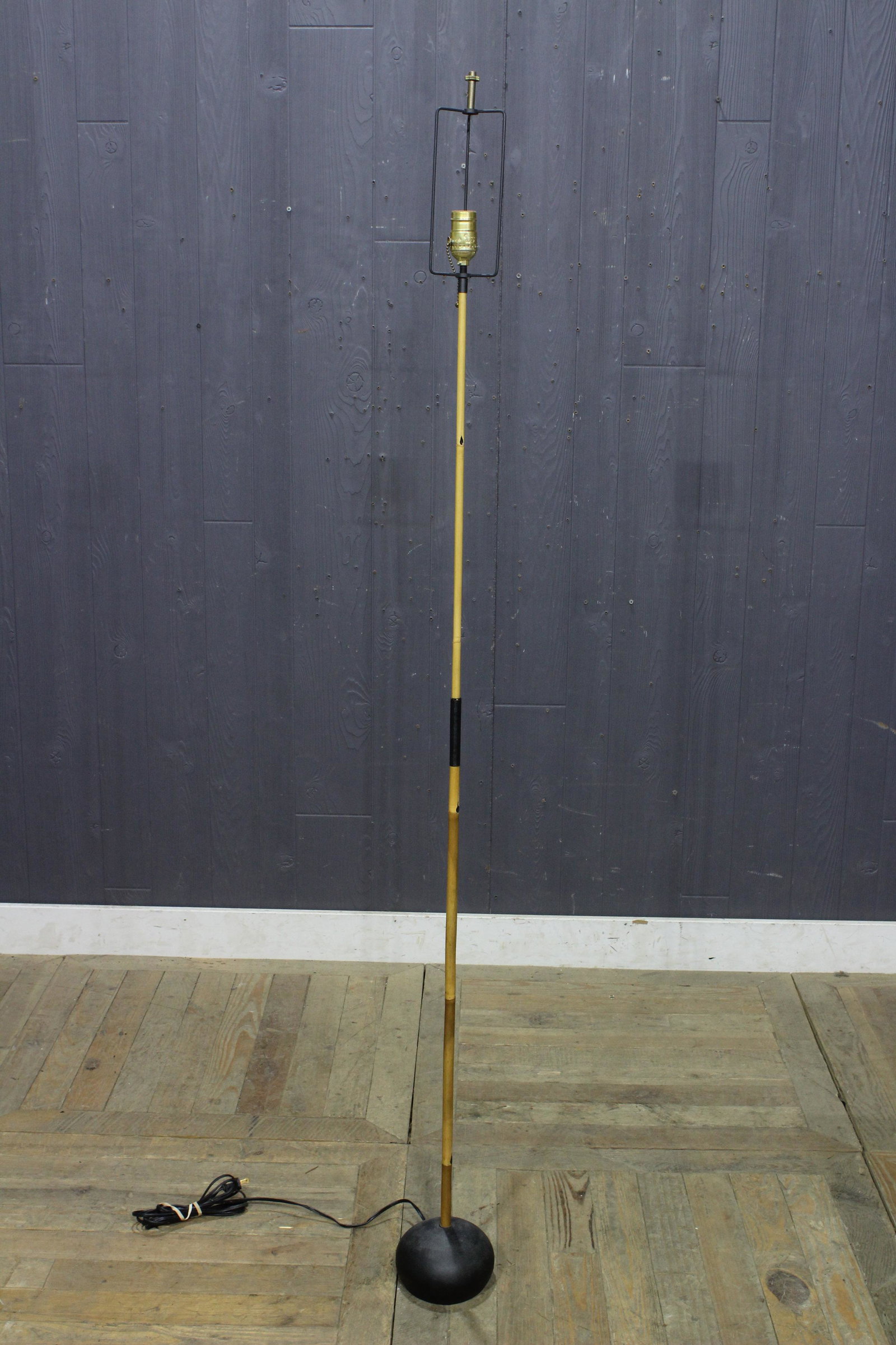 Isamu Noguchi Bamboo Floor Lamp: Isamu Noguchi Bamboo Floor Lamp, no shade, base marked Made in Japan. Size: 66" H x 5.5" W x 5.5" D