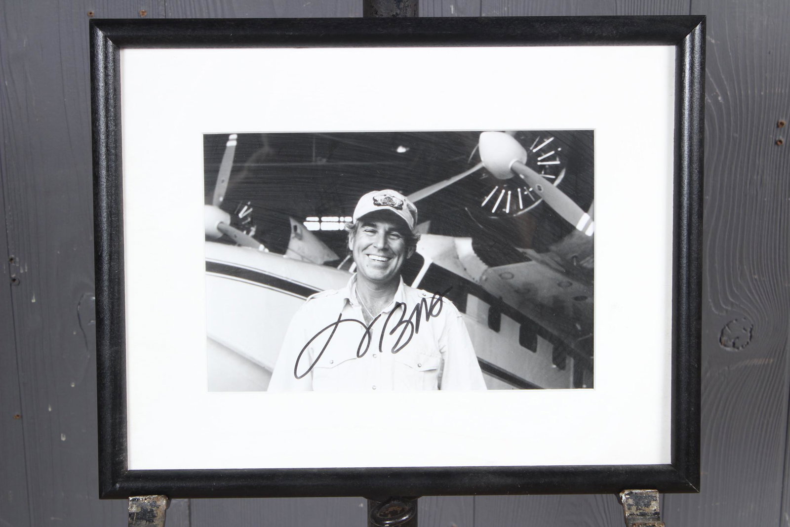Autographed Jimmy Buffet Photo: Autographed Jimmy Buffet Photo. Size: Framed: 11" H x 14" W x 1" D; Sight: 6" H x 9" W