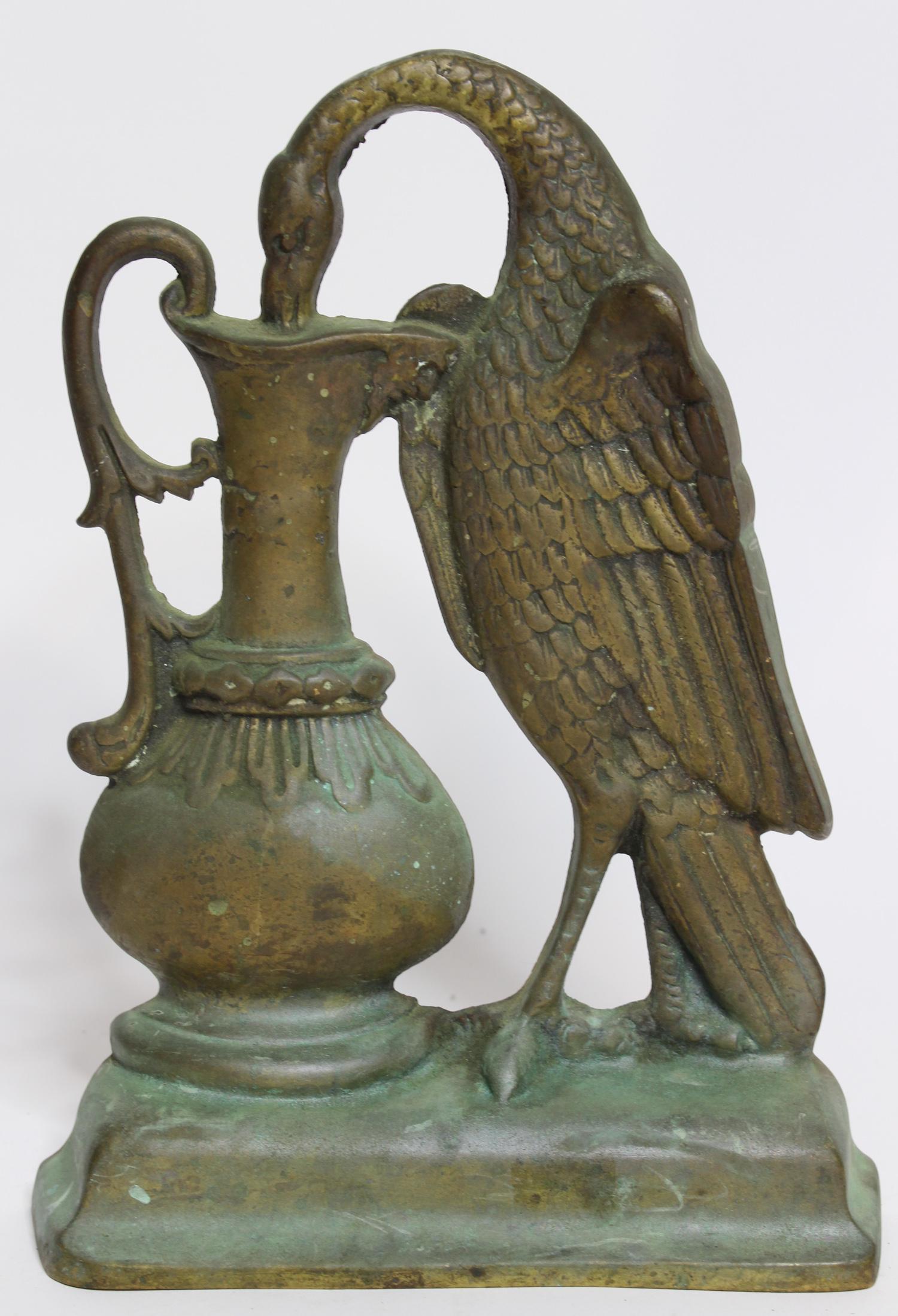 Bronze Figural Doorstop: Bronze Figural Door stop, Swan and an Ewer. Size: 10.5" H x 7.5" W x 2" D ***Please Note: This is an on-site online auction with specific Pick up terms and conditions. Pick up day is scheduled for 8/2
