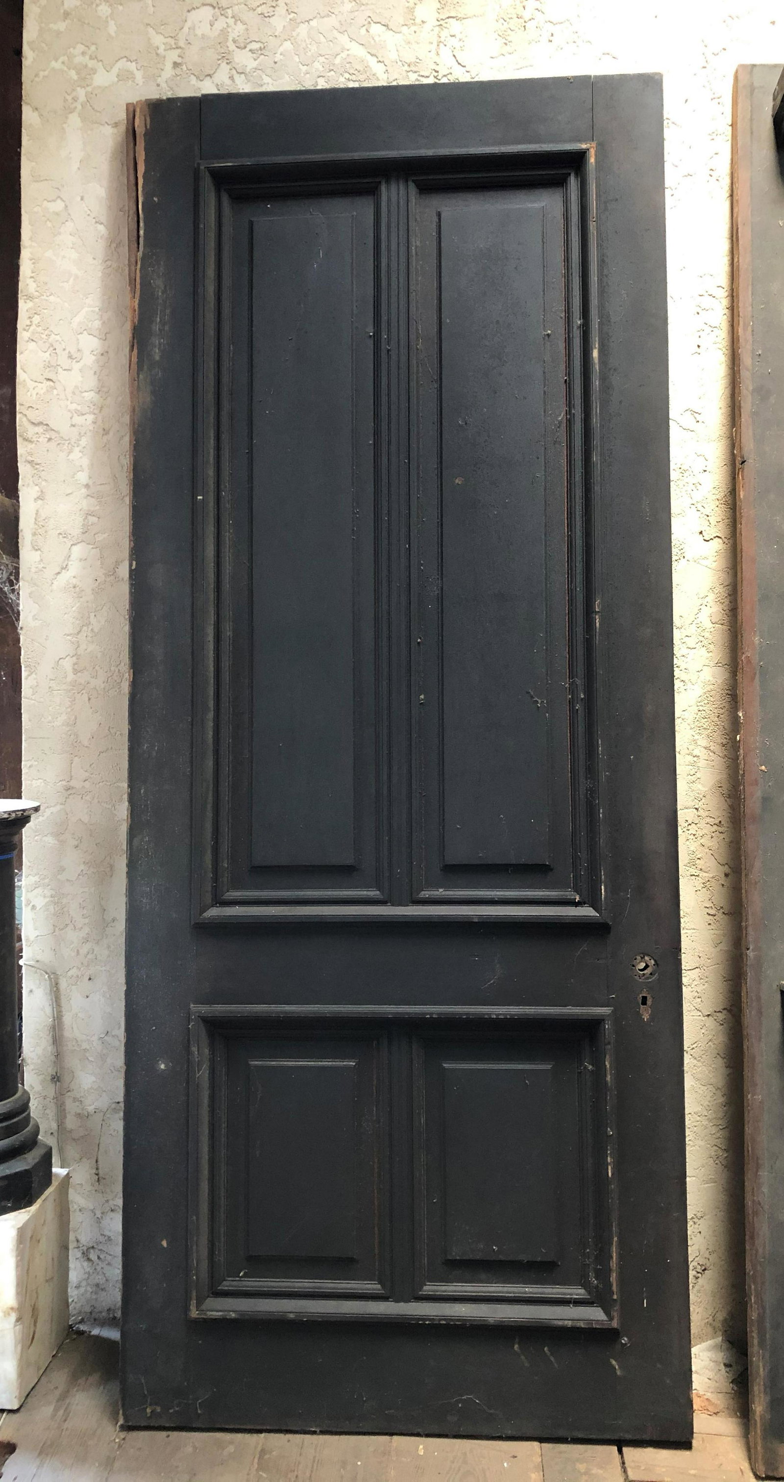 Monumental Antique Carved Oak Door: Monumental Antique Carved Oak Door, late 19th to turn of the century American possibly carved oak door having deep molding and raised panel decoration. Size: 120" H x 49" W x 3" D. ***Please Note: Thi