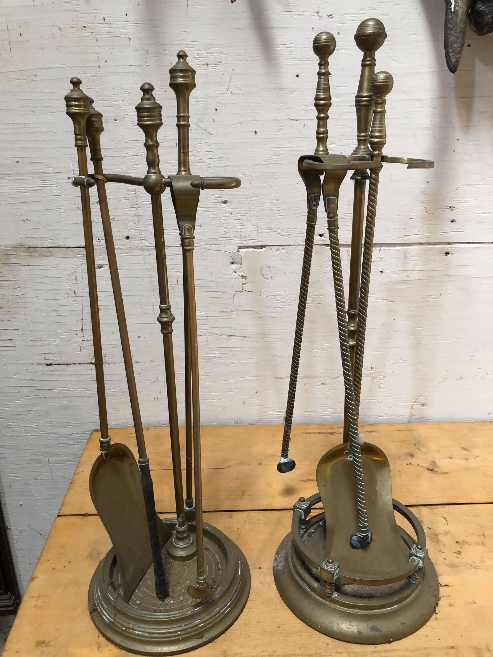 Lot of 2 Brass Fireplace Stands and Tools: Lot of 2 Brass Fireplace Stands and Tools. Size: Largest: 28" H x 9" Diameter. ***Please Note: This is an on-site online auction with specific Pick up terms and conditions. Pick up day is scheduled fo