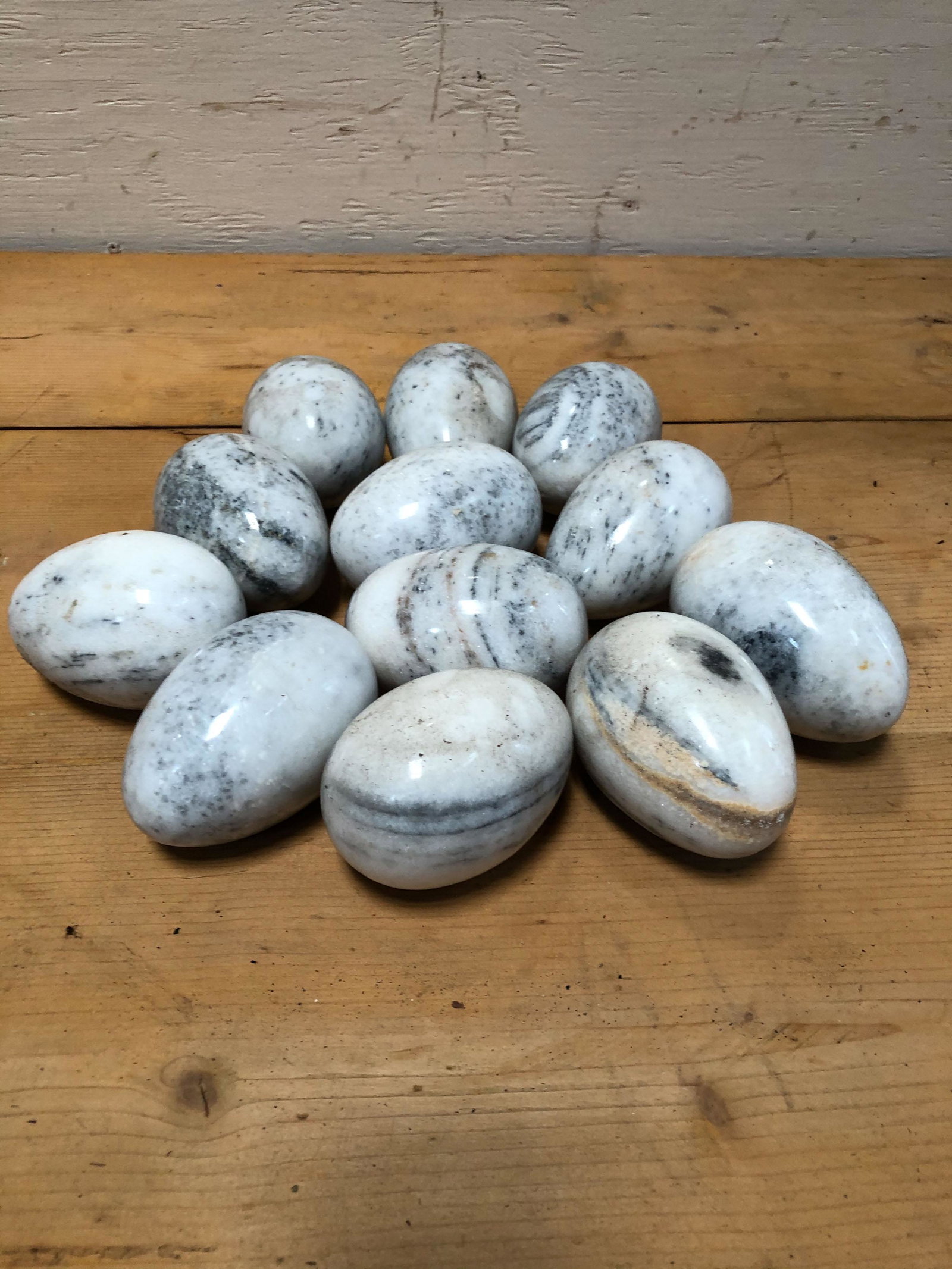 Interesting lot of 12 Shaped Marble Eggs: Interesting lot of 12 Shaped Marble Eggs. Size: Swan/Goose. ***Please Note: This is an on-site online auction with specific Pick up terms and conditions. Pick up day is scheduled for 8/29 in Frazer, P