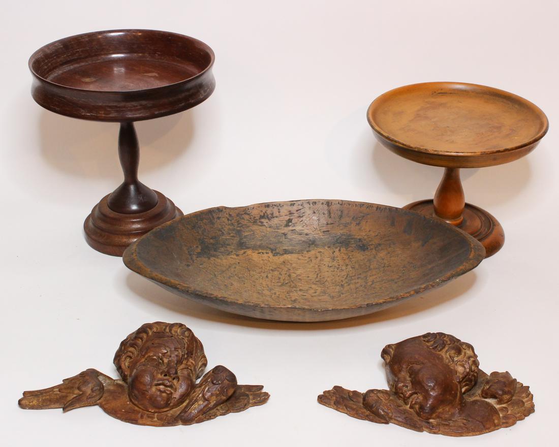 Lot of Treen: 2 Turned Treen Compotes, Trough, Putti Wall Plaques. Size: Largest: 11" H x 10" W x 10" D ***Please Note: This is an on-site online auction with specific Pick up terms and conditions. Pick up day is s