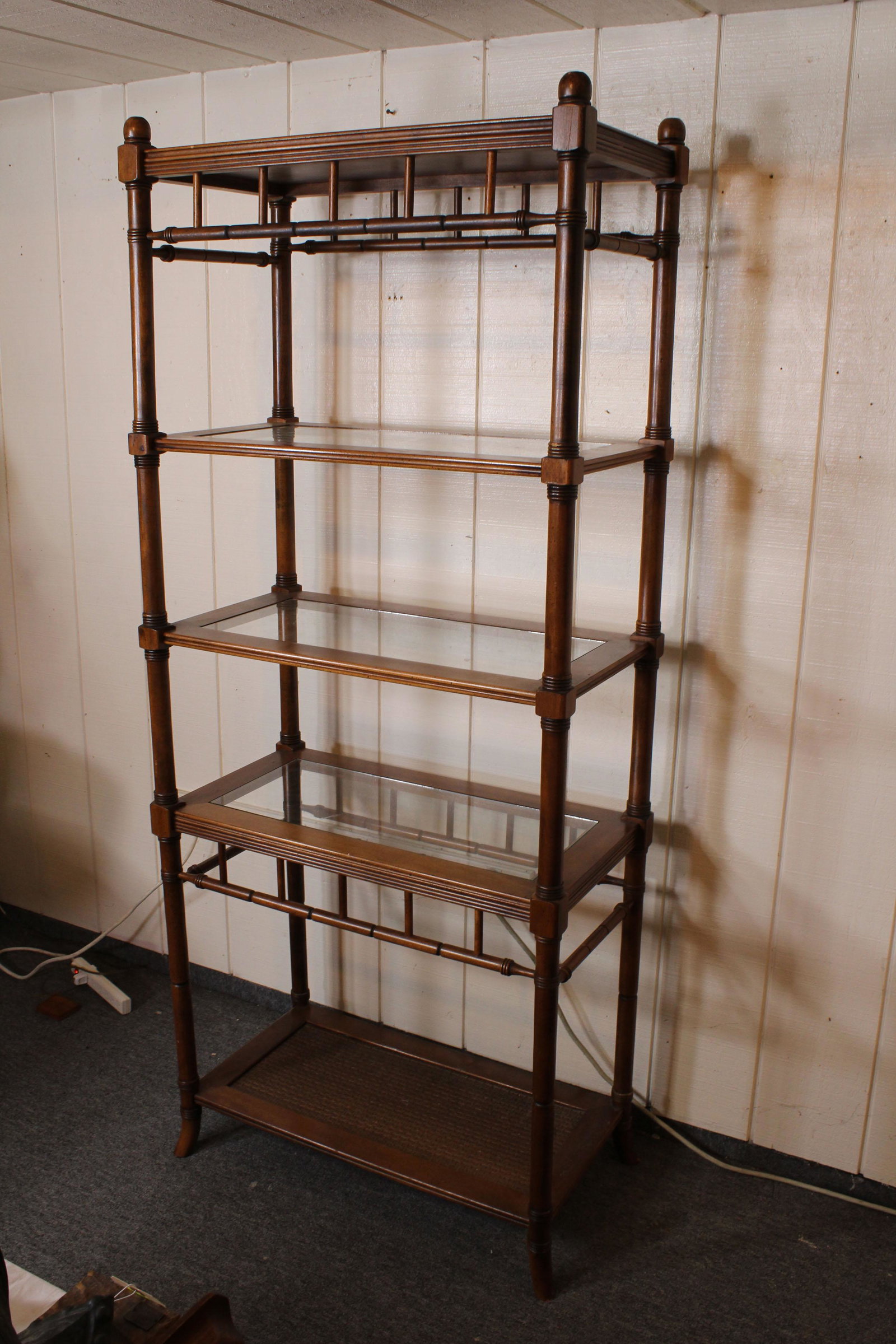 Faux Bamboo Etagere: Etagere, five shelves, three glass top. Size: 71.5"H x 30"W x 16.25"D ***Please Note: This is an on-site online auction with specific Pick up terms and conditions. Pick up day is scheduled for 8/29 in