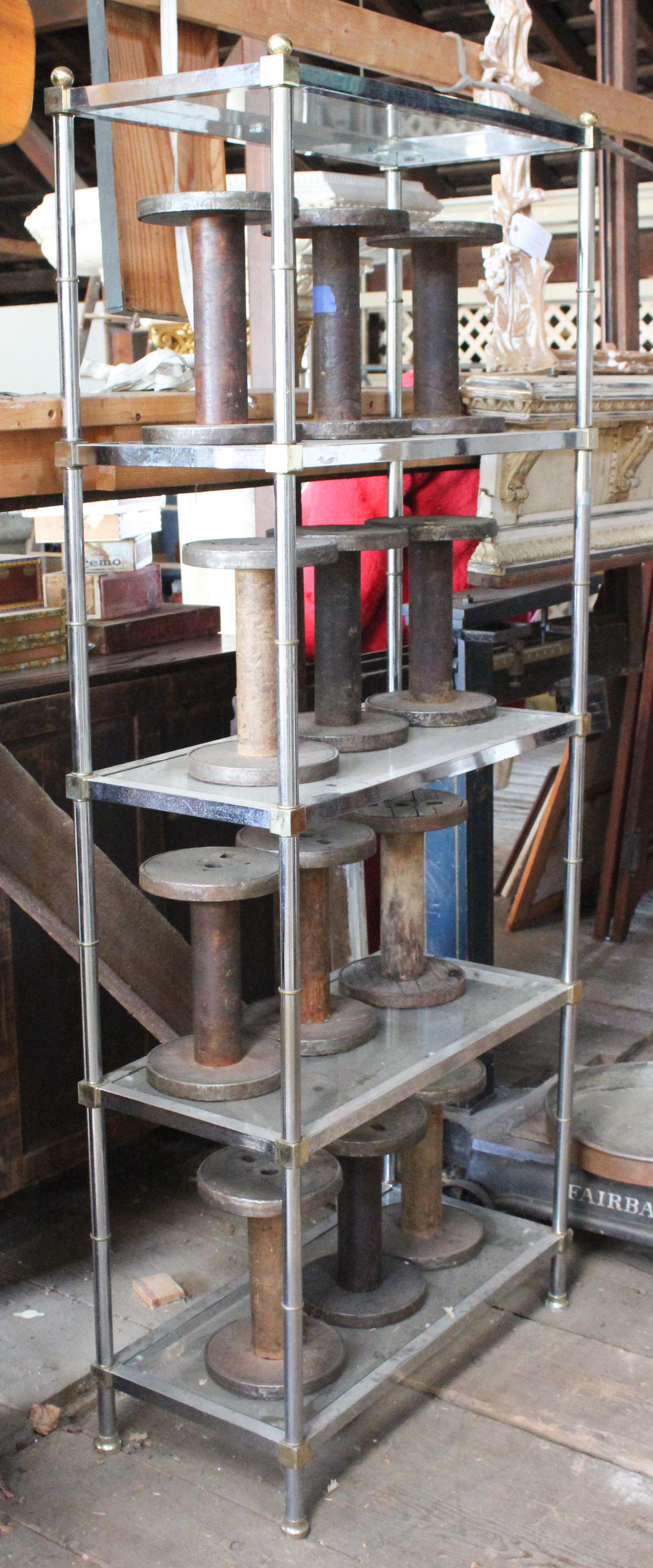 Vintage Chrome and Brass Etegere: Vintage chrome and brass etagere with insert glass shelves. Size: Spools not included. ***Please Note: This is an on-site online auction with specific Pick up terms and conditions. Pick up day is sche