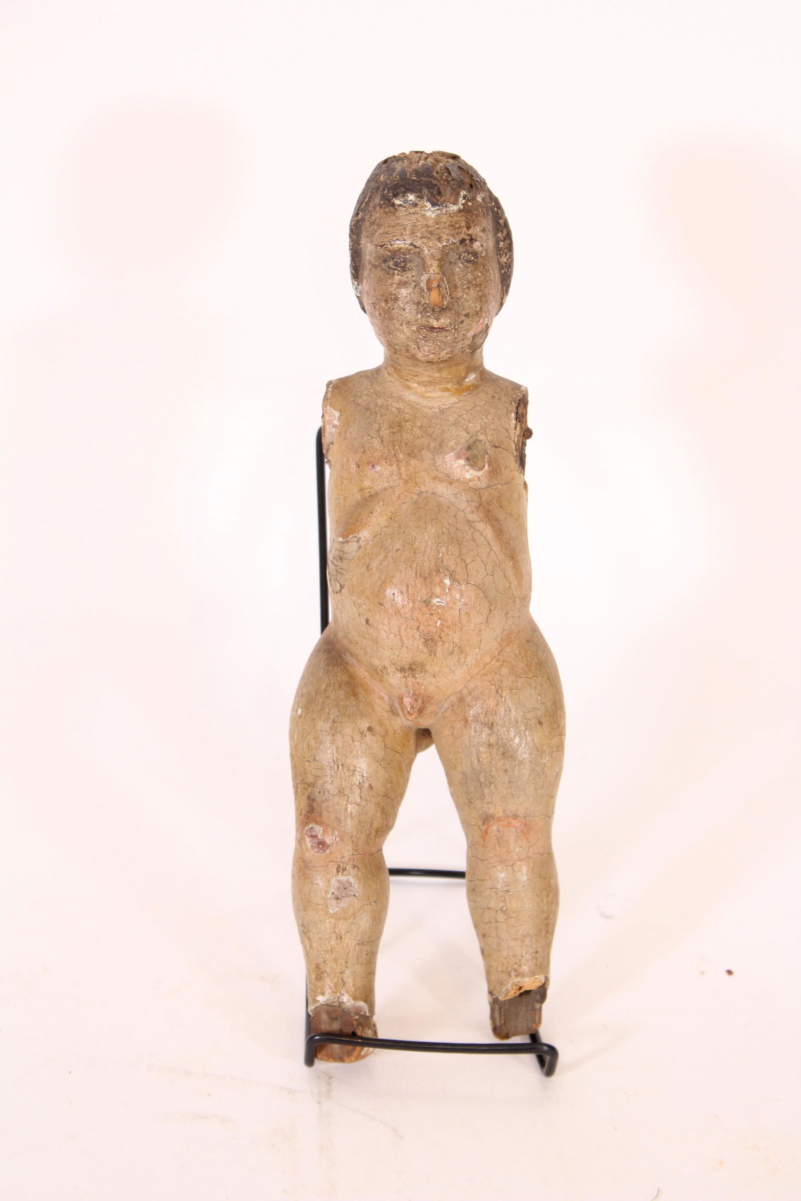 Early Carved Wood & Composition Infanta Figure: Early Carved Wood & Composition Infanta Figure, painted features. Size: 12.75" H x 4" W x 3.25" D. ***Please Note: This is an on-site online auction with specific Pick up terms and conditions. Pick up