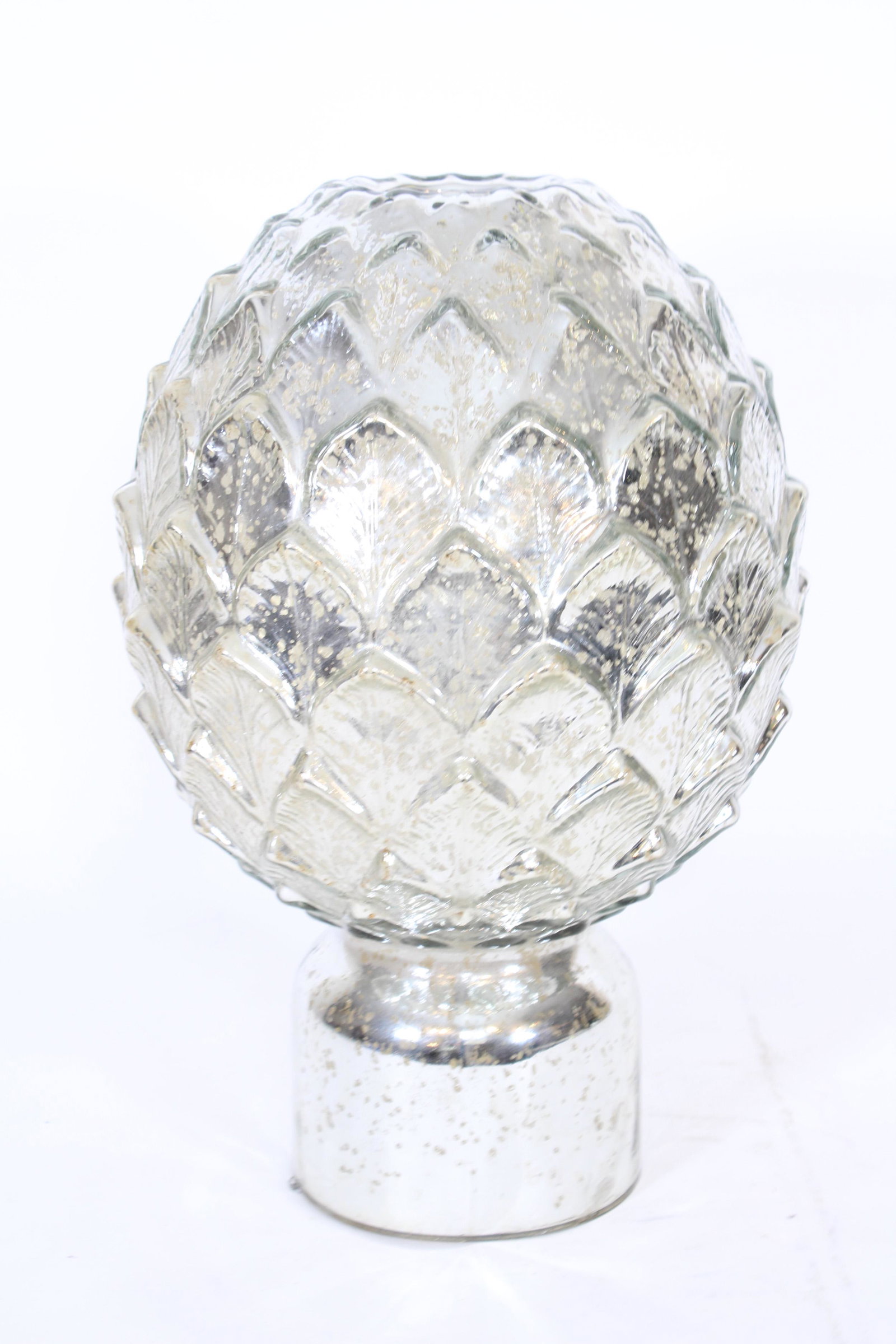 Large Mercury Glass Artichoke Sculpture: Large Mercury Glass Artichoke Sculpture, candle holder. Size: 18.5" H x 12" Diameter ***Please Note: This is an on-site online auction with specific Pick up terms and conditions. Pick up day is schedu