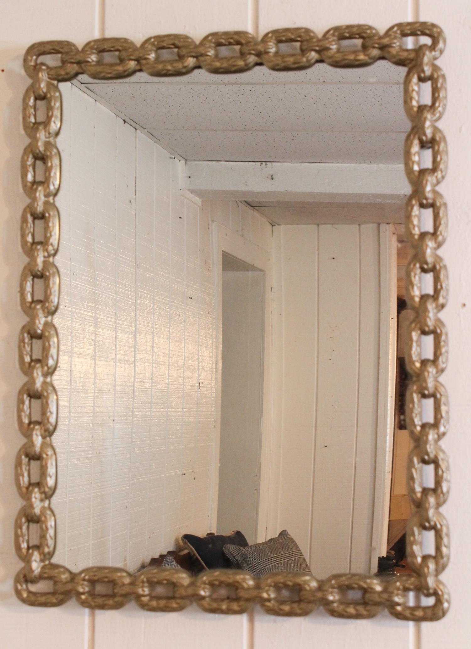 Decorative Cast metal Chain Link Frame Mirror: Cast metal Chain Link Frame Mirror. Size: 28" x 21" ***Please Note: This is an on-site online auction with specific Pick up terms and conditions. Pick up day is scheduled for 8/29 in Frazer, PA. There