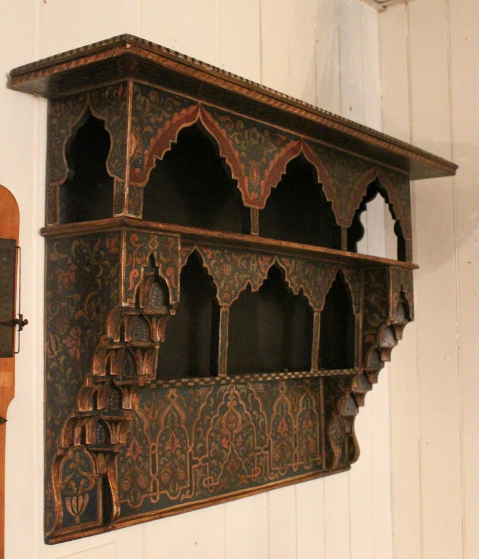 Moorish Style Carved and Painted Hanging Shelf: Moorish Style Carved and Painted Hanging Shelf. Size: 25" x 37" x 9" ***Please Note: This is an on-site online auction with specific Pick up terms and conditions. Pick up day is scheduled for 8/29 in 