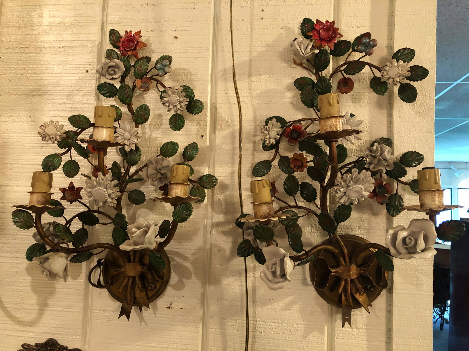 Pair Tole Painted Metal and Porcelain Sconces: Pair Continental Tole Painted Metal and Porcelain Candelabra Sconces. Electrified. Size: 19" x 11" ***Please Note: This is an on-site online auction with specific Pick up terms and conditions. Pick up