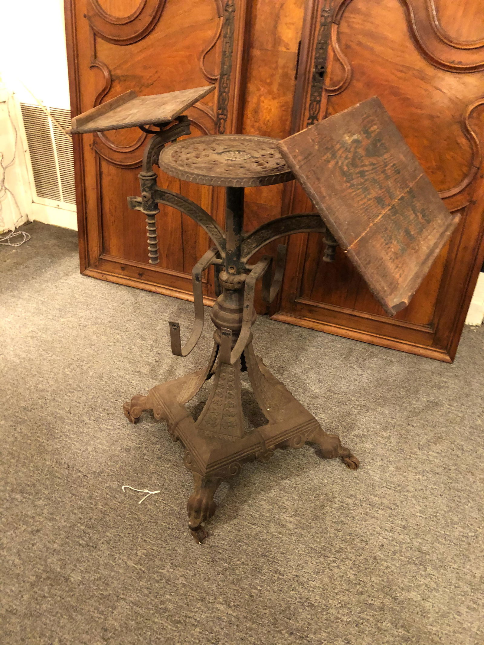Halloway Reading Stand and Dictionary Holder: Halloway Reading Stand and Dictionary Holder. Cast iron base. Decorated with a game board. Perfect for the home classroom. Size: 29" high over 18" x 18" base. ***Please Note: This is an on-site online