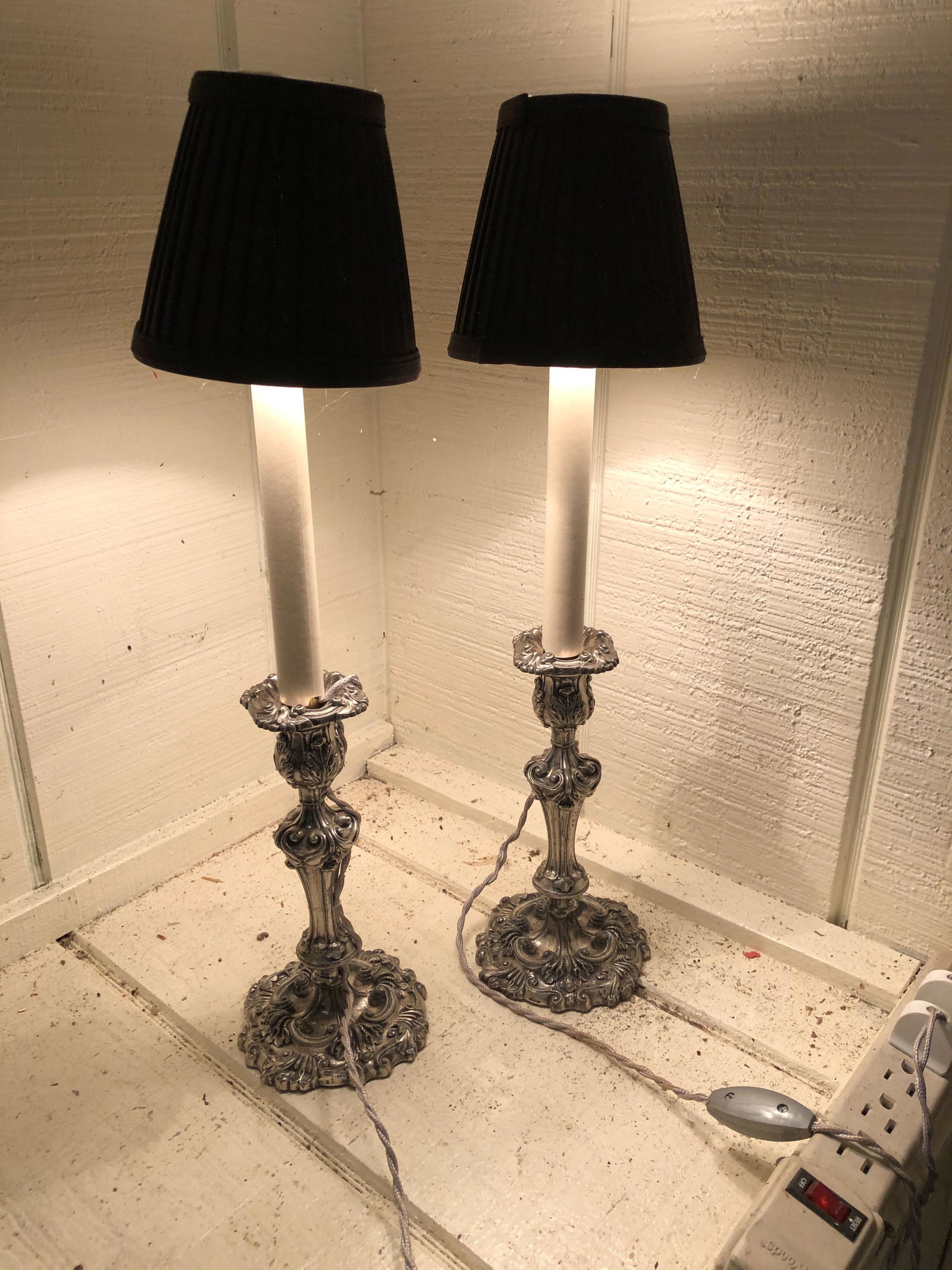 Pair Electrified Silverplate Candle Sticks: Pair Electrified Silverplate Candle Sticks. Size: 20" H ***Please Note: This is an on-site online auction with specific Pick up terms and conditions. Pick up day is scheduled for 8/29 in Frazer, PA. T