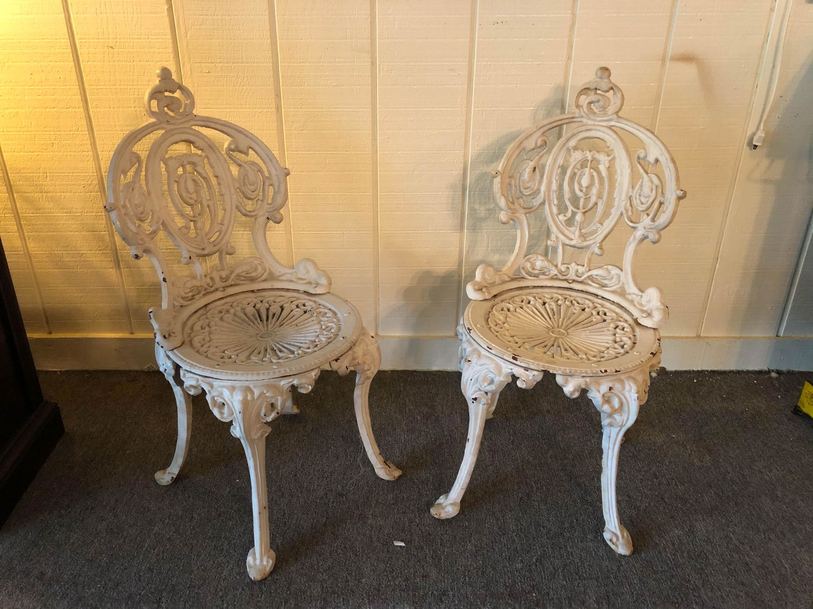 Pair Cast Iron Garden Chairs: Pair Cast Iron Garden Chairs. Size: 30" x 14" x 16" ***Please Note: This is an on-site online auction with specific Pick up terms and conditions. Pick up day is scheduled for 8/29 in Frazer, PA. There
