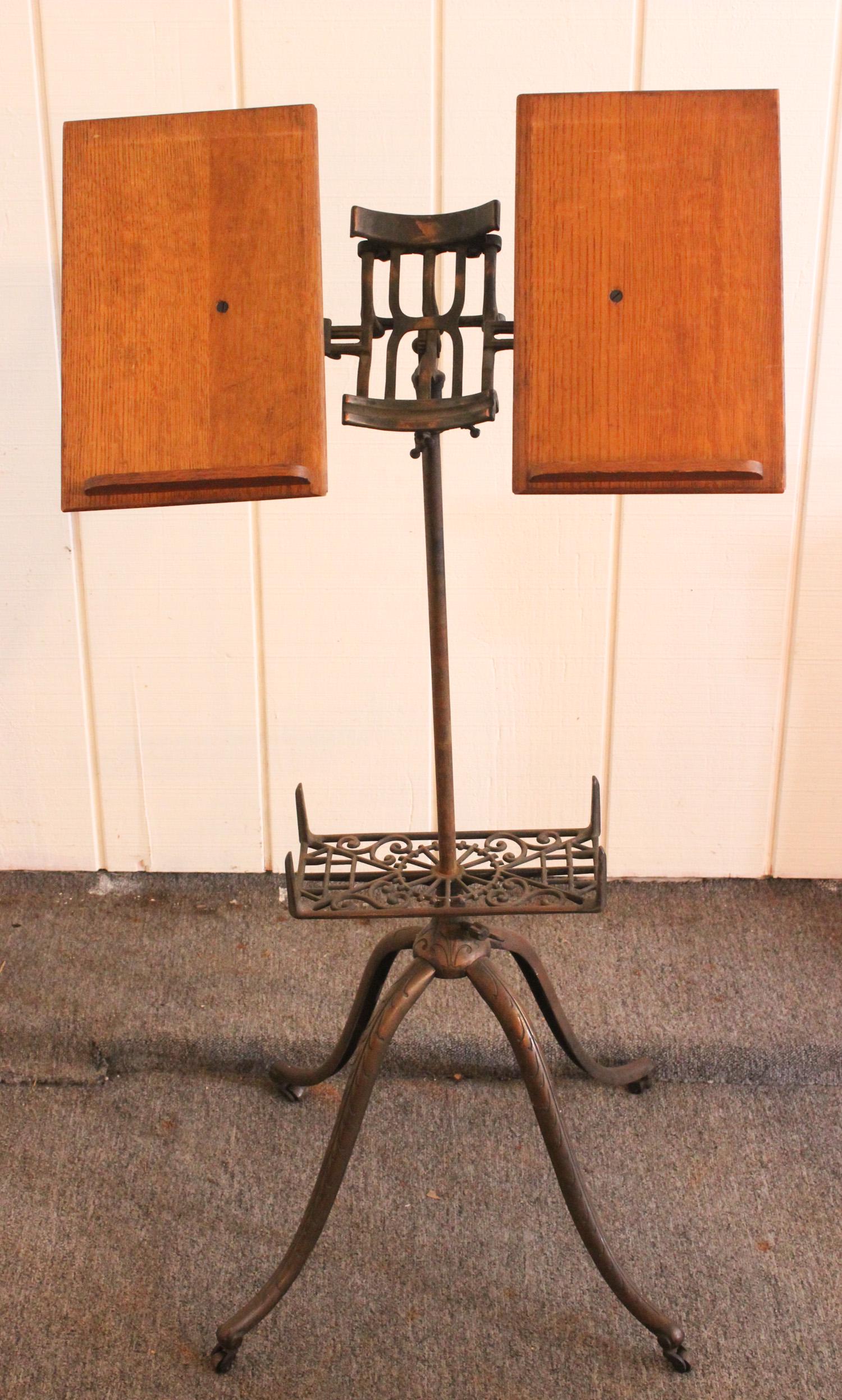 Victorian Copper Finished Cast Iron Book Stand: Victorian Copper Finished Cast Iron Library Book or Dictionary Stand. Adjustable height and viewing angle. Size: 44" x 21.5" x 16" ***Please Note: This is an on-site online auction with specific Pick 