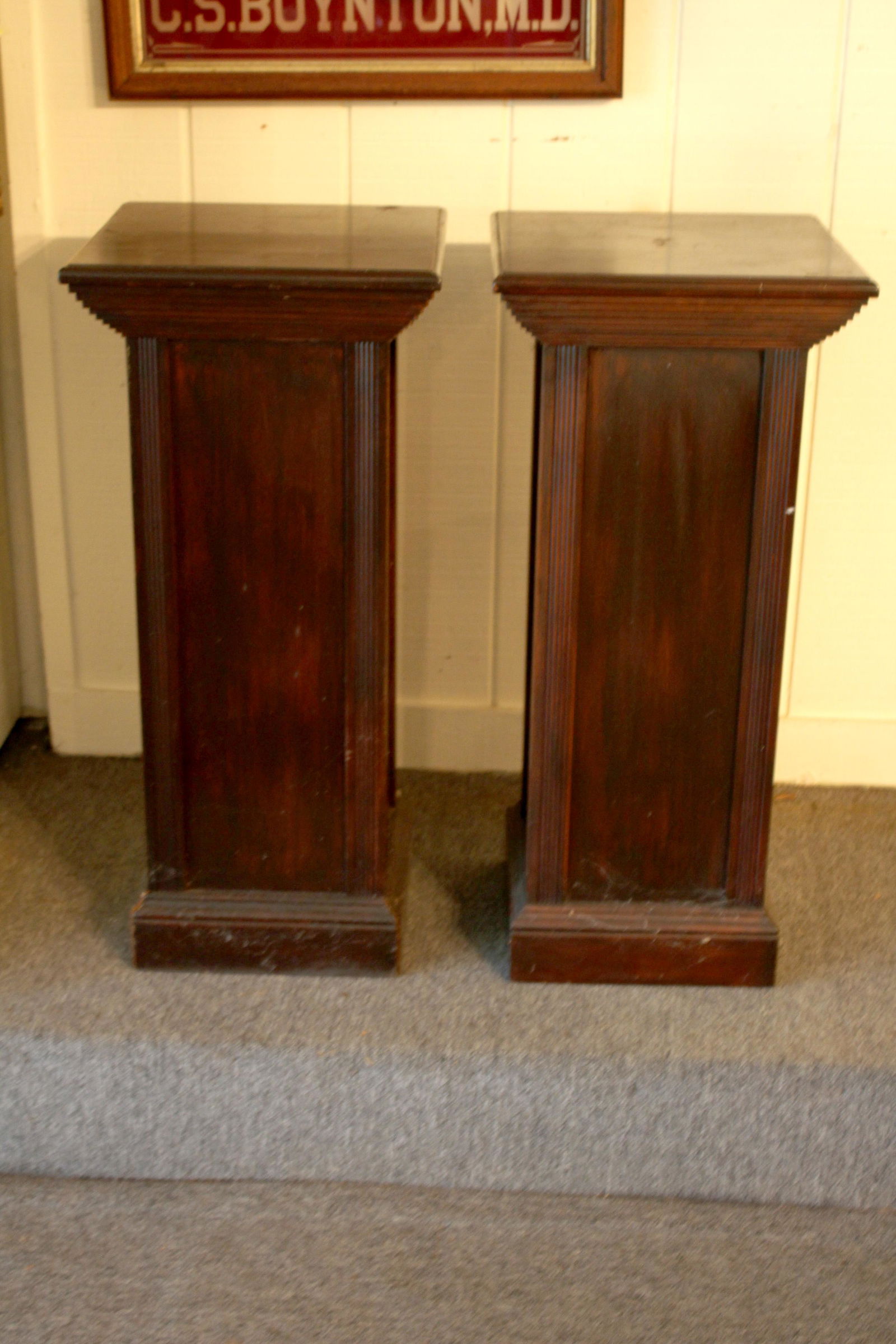 Pair Mahogany Pedestals: Pair Mahogany Pedestals with stepped top over reeded corners. Size: 33" x 15" x 15" ***Please Note: This is an on-site online auction with specific Pick up terms and conditions. Pick up day is schedul