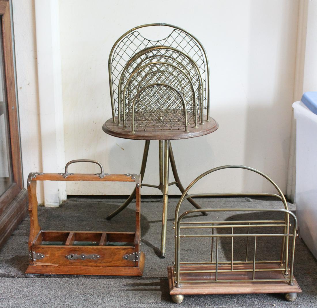 Group of 3 Carrying Racks: Interesting lot of three estate items including, a Tantalus carrier and two periodical racks both with brass dividers. Size: 29" x 15" Dia. ***Please Note: This is an on-site online auction with speci