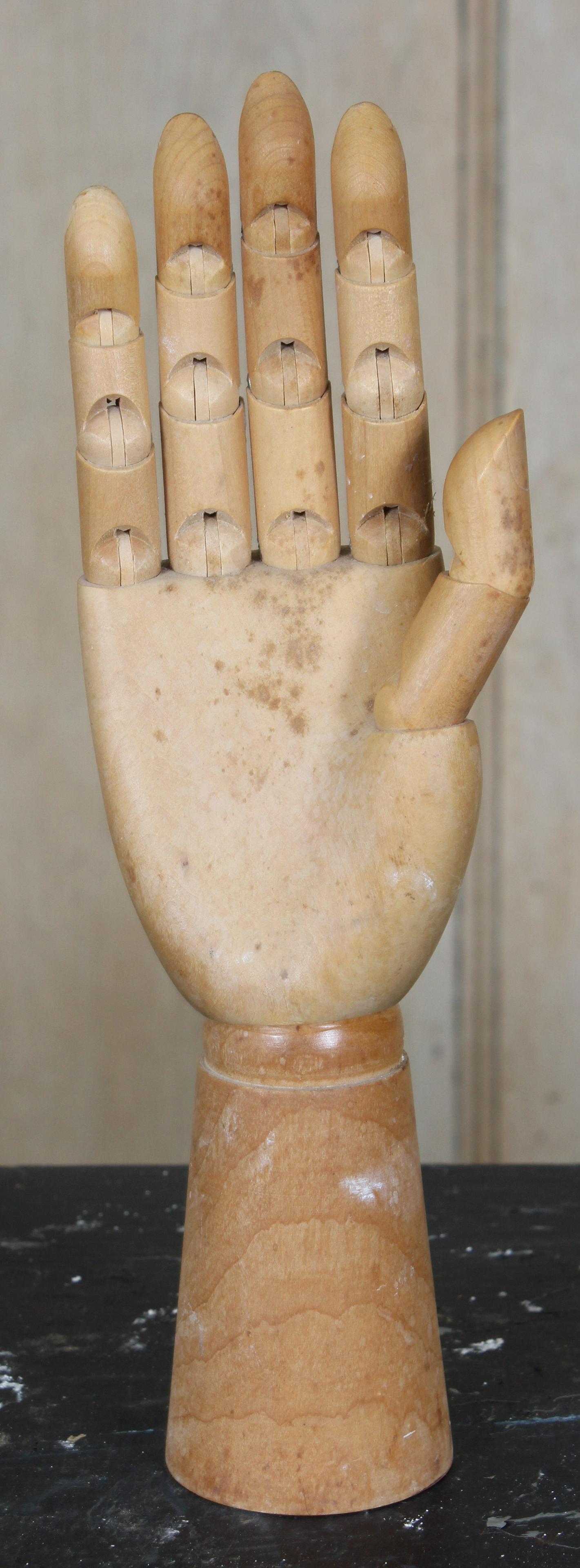 Articulated Wood Carved Artist's Lay Hand: Articulated Wood Carved Artist's Lay Hand, mannequin. Size: 11.5" H x 4" W x 3" D