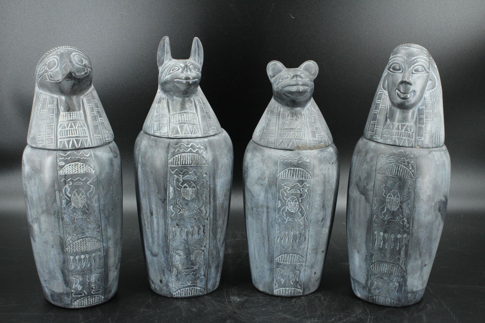 Set Of 4 Soapstone Canopic Jars: Set of 4 Soapstone Canopic Jars. Size: Tallest 14"H x 5"W x 5"D