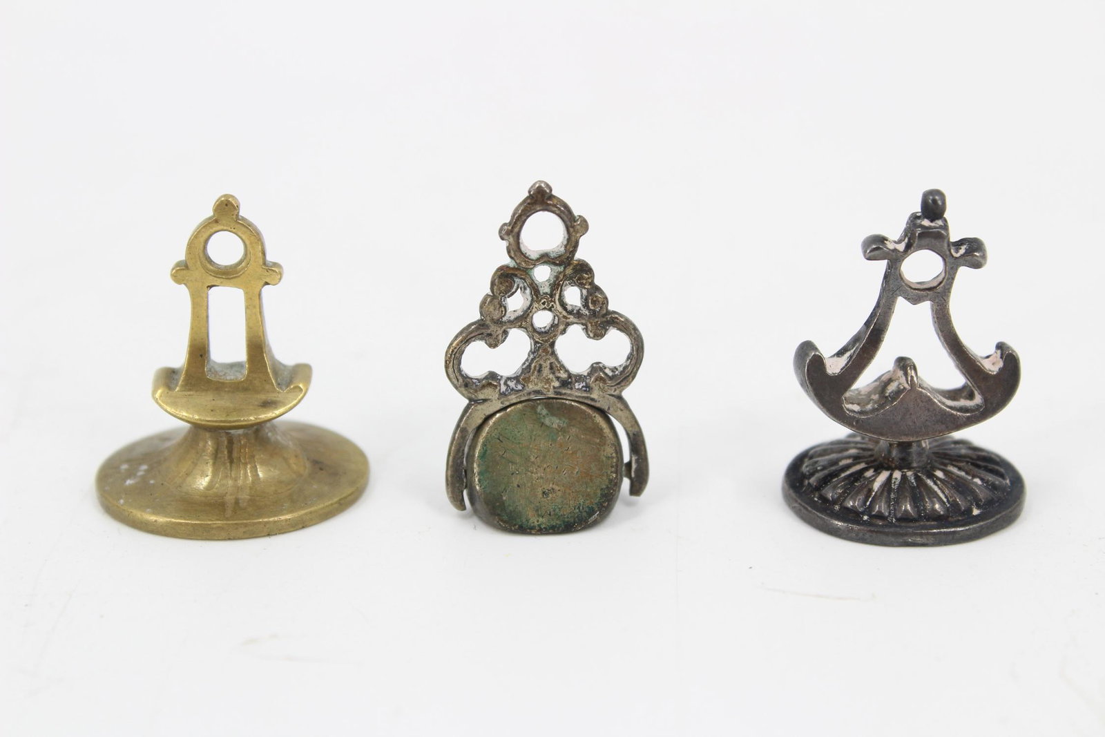 3 Antique Fob Wax Seals: 3 Antique Fob Wax Seals. NHJ125. Size: Largest: 1.25" H X 0.75" W X 0.5" D