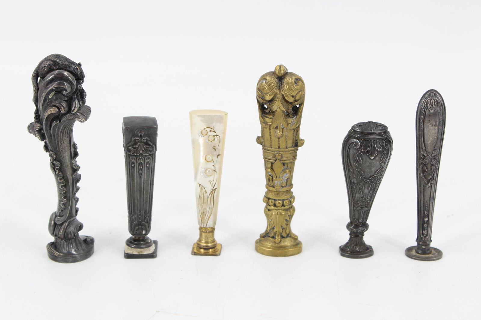 6 Desk Wax Seals: 6 Desk Wax Seals. NHJ125. Size: Largest: 4" H X 1.5" W X 1" D