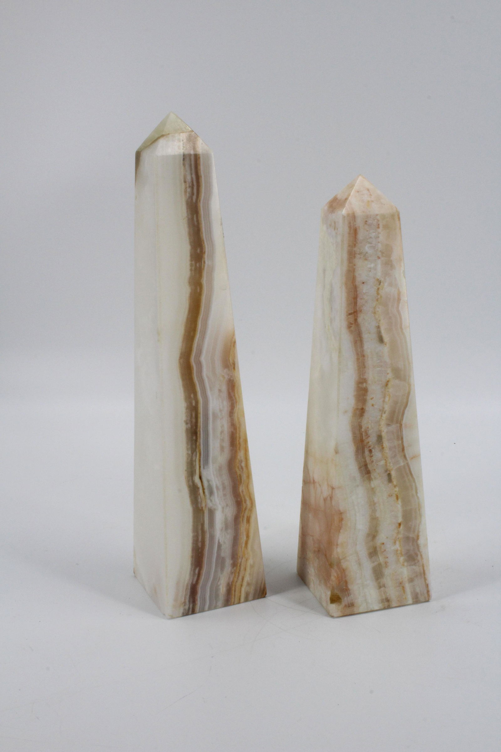 Pair Onyx Obelisks: Pair Onyx Obelisks. Size: 14" taller.