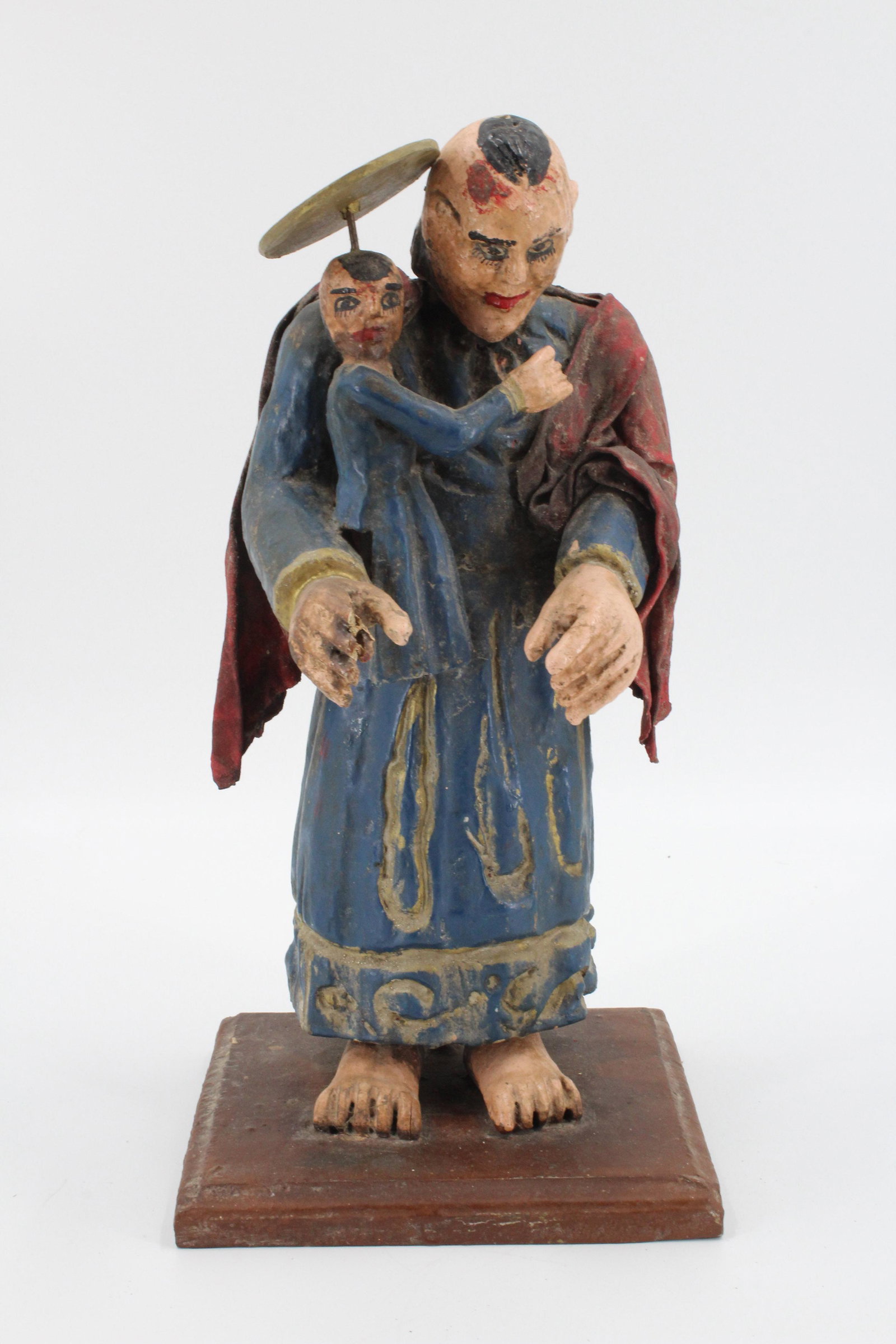Mexican St Christopher Santos Figure: Mexican St Christopher Santos Figure. carved wood. Size: 14.5" high on 7" x 6.5" base