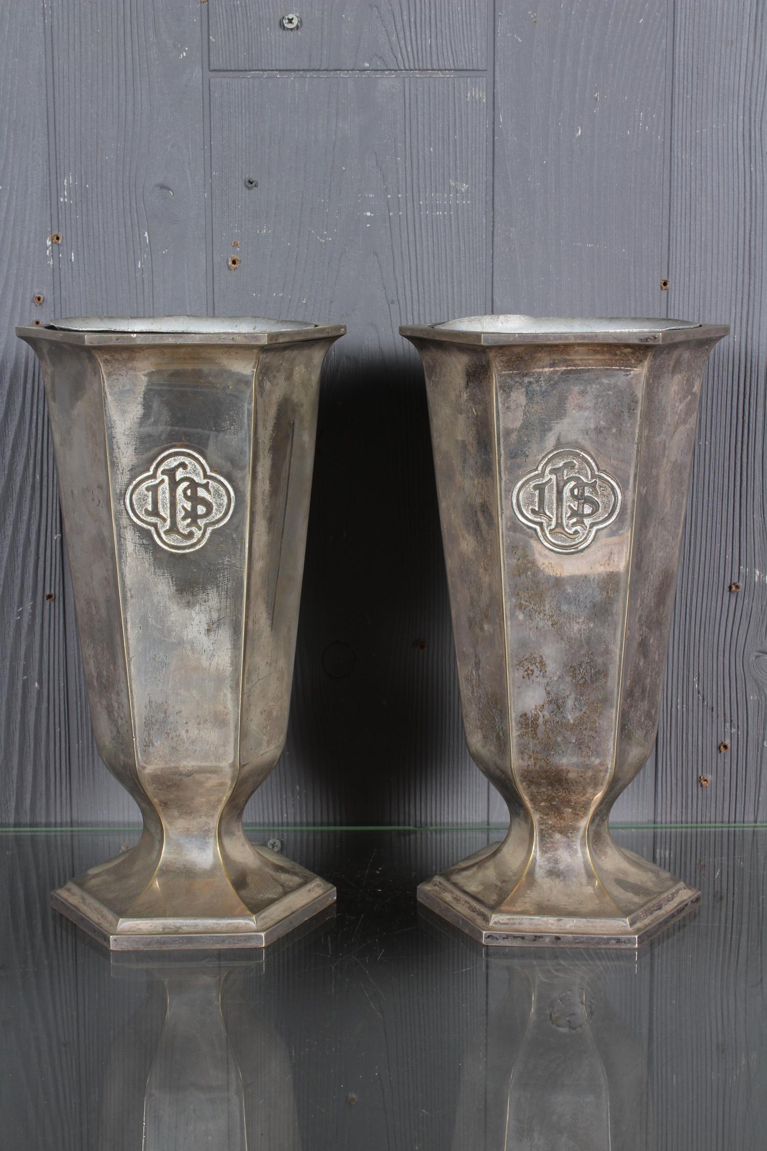 Large Pair of Altar Vases: Large Pair of Altar Vases, IHS on front, hexagonal step bases, unmarked, in the manner of Rostand, aluminum inserts marked St. Aiden's 2. Size: 12.5" H x 6.75" W x 6" D.