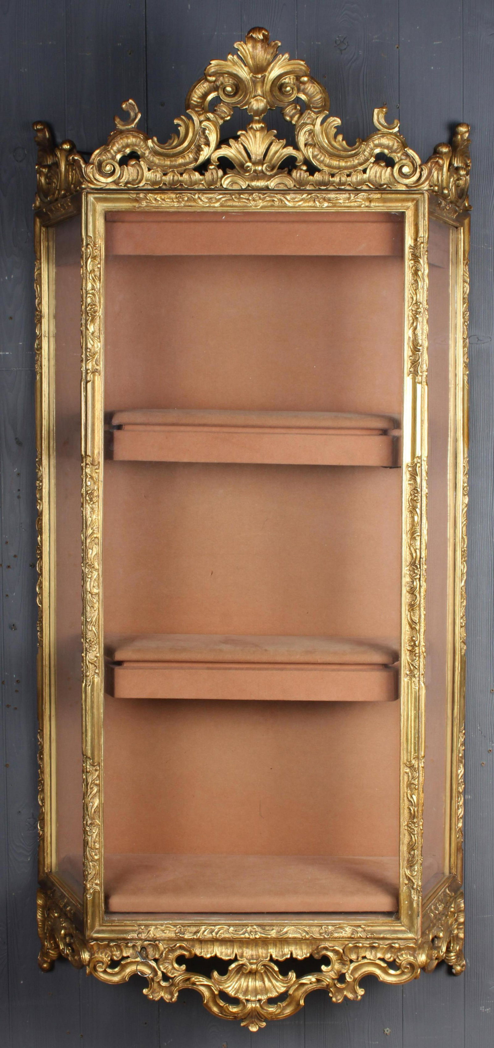 Rococo Style Carved Gilt Wood Wall Hung Vitrine: Rococo Style Carved Gilt Wood Wall Hung Vitrine. With key. Wired for halogen lighting, not tested. Size: 59" x 27.5" x 12'