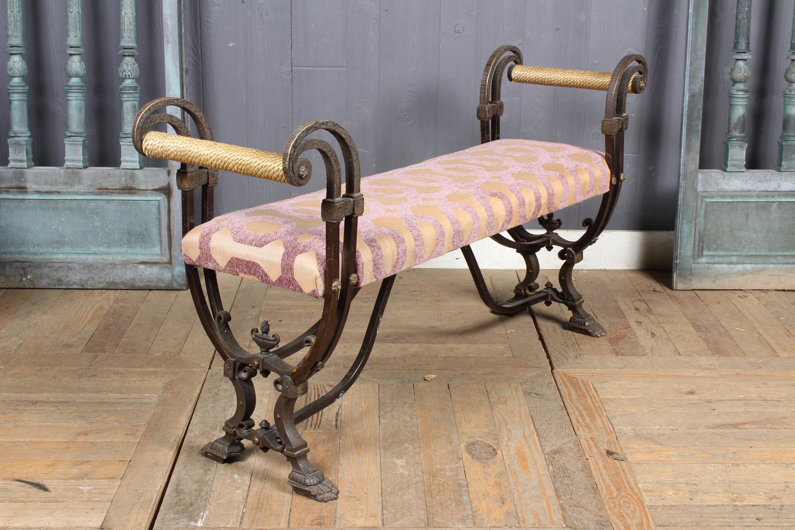 Fer Forge Wrought and Cast Iron Bench: Fer Forge Wrought and Cast Iron Bench in the manner of Oscar Bach with upholstered seat and paw feet. Size: 26.5" H x 49" W x 14" D