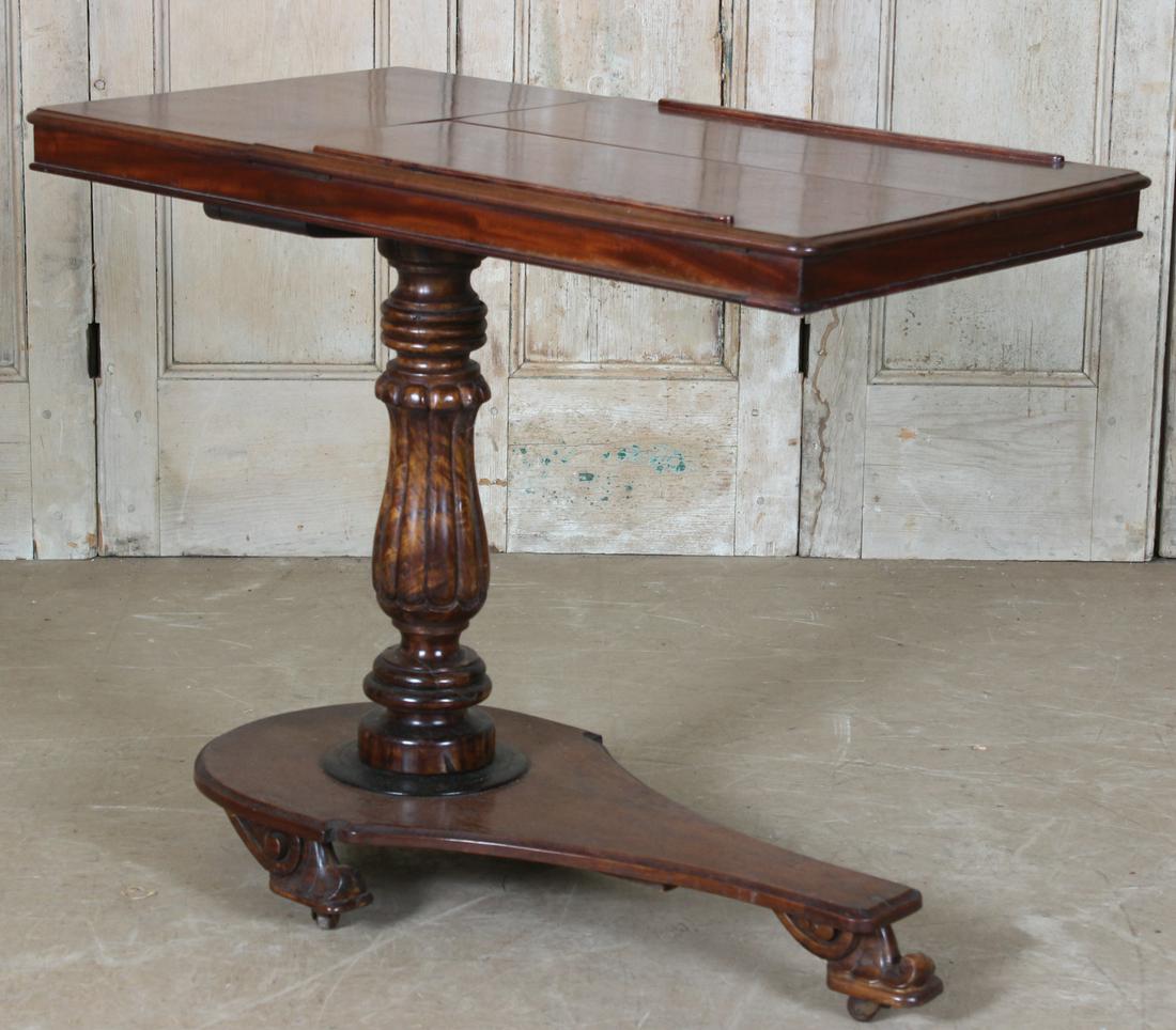 19th C William IV Style Mahogany Reading Table: An English 19th C. William IV style mahogany reading table having two book easels supported on turned post and platform base. Size: 29.5" H x 36" W x 20.5" D