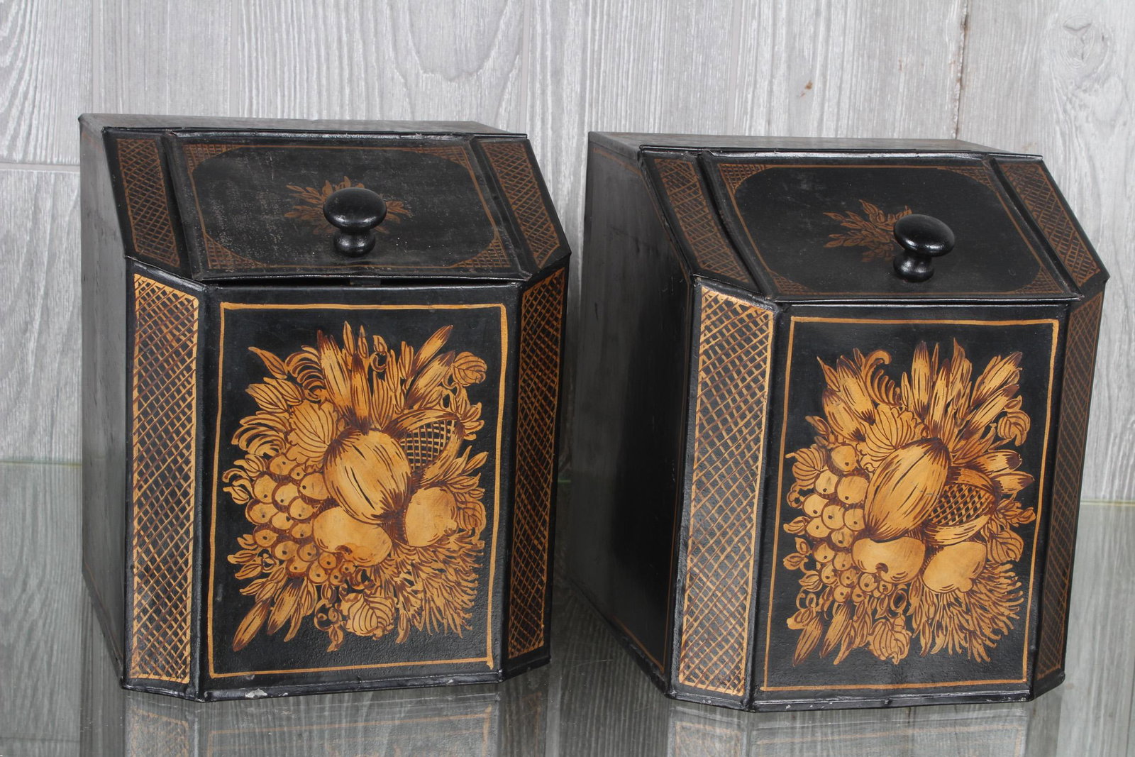 Pair Tole Decorate Tea Tins: A pair of tole painted and gilt decorated tea tins. Size: 9" H x 7.5" W x 8" D