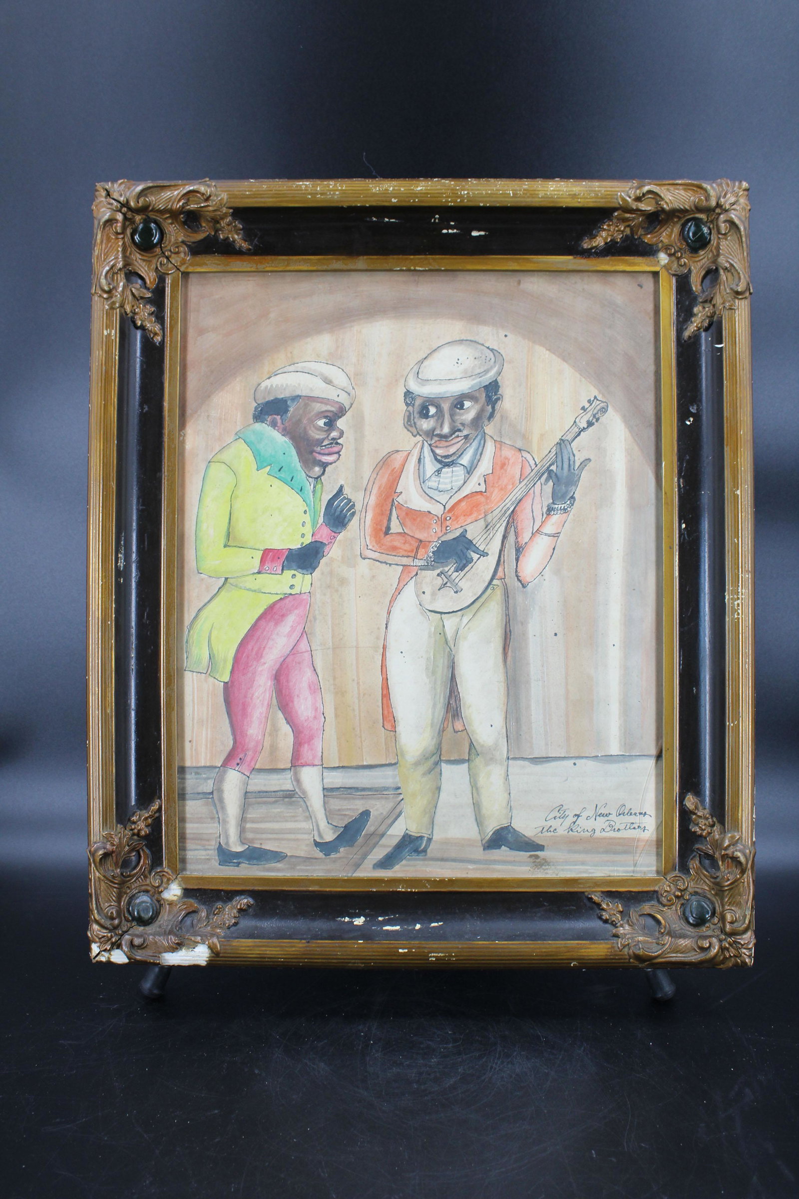 Framed Black Americana Drawing The King Brothers: Framed Black Americana Drawing The King Brothers, depicting two figures, one playing instrument, titled lower right "City of New Orleans, The King Brothers". Size: Frame: 25" H x 21" W, Sight: 19.5" H