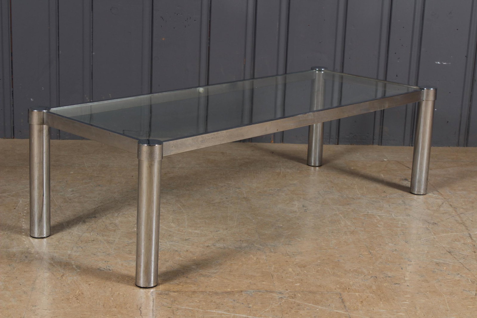 Chrome and Glass Coffee Table: Chrome and Glass Coffee Table. Size: 15" H x 51" W x 21" D.