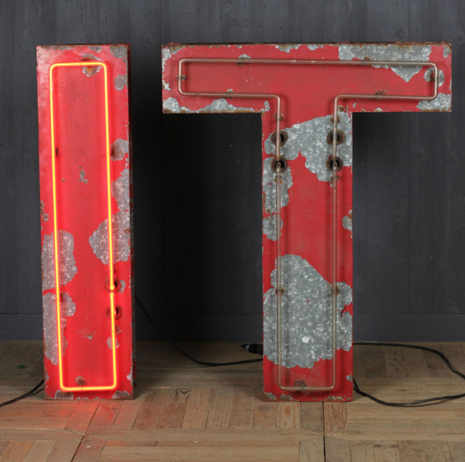 Vintage Neon IT Sign: Vintage Neon IT Sign. Size: 48.25" x 38.25" x 8" body, tubes extend 2.5" above body.