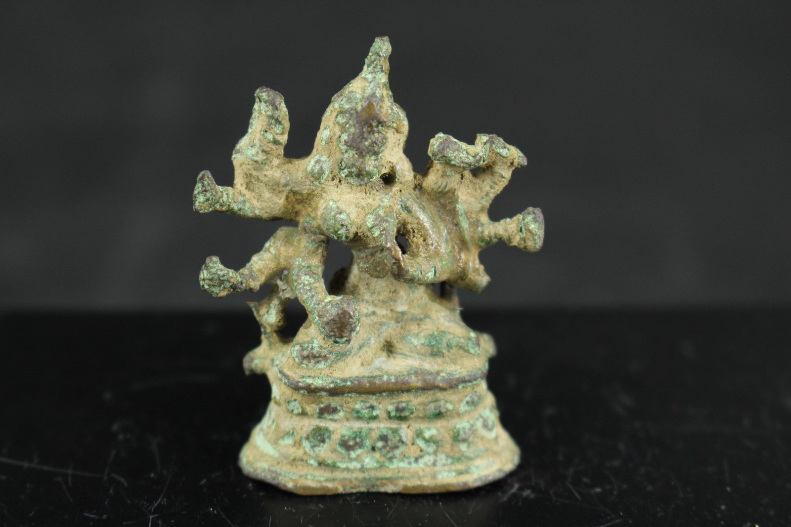 Ancient Pala Dynasty Figural Bronze Deity: Ancient Pala Period Figural Bronze (11-12th Century) -- Shiva Nataraja. Size: 1.5" x 1.5" x .5" (P55)