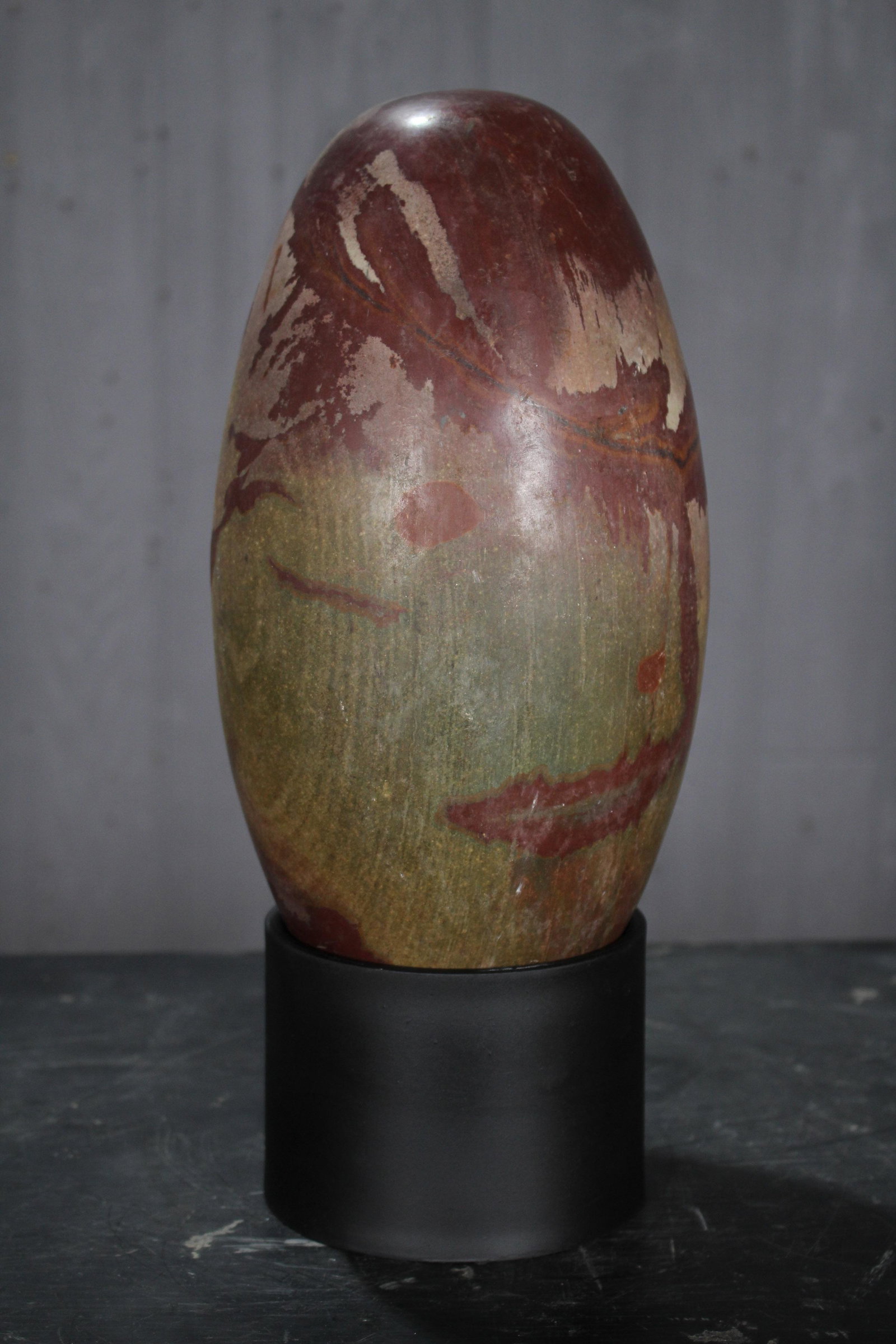 12.5" Shiva Lingam Stone: Shiva Lingam Stone. Size: 12.5" x 6" diameter. 14.5" overall Height on stand.