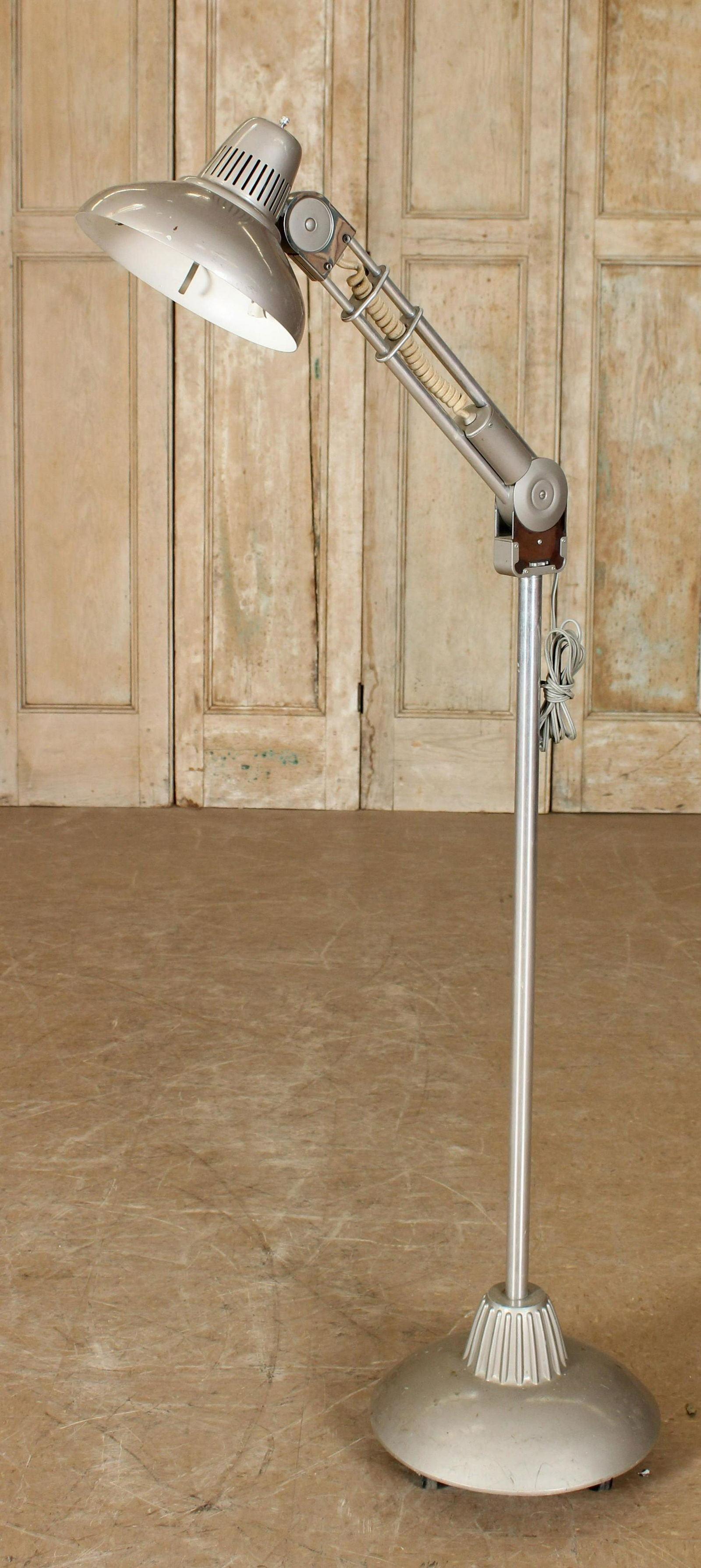 Vintage Amplex Swivelite on Casters: Vintage Amplex Swivelite on Casters, floor light, shop light, adjustable, labeled. Size: 44.5" H x 13" Diameter