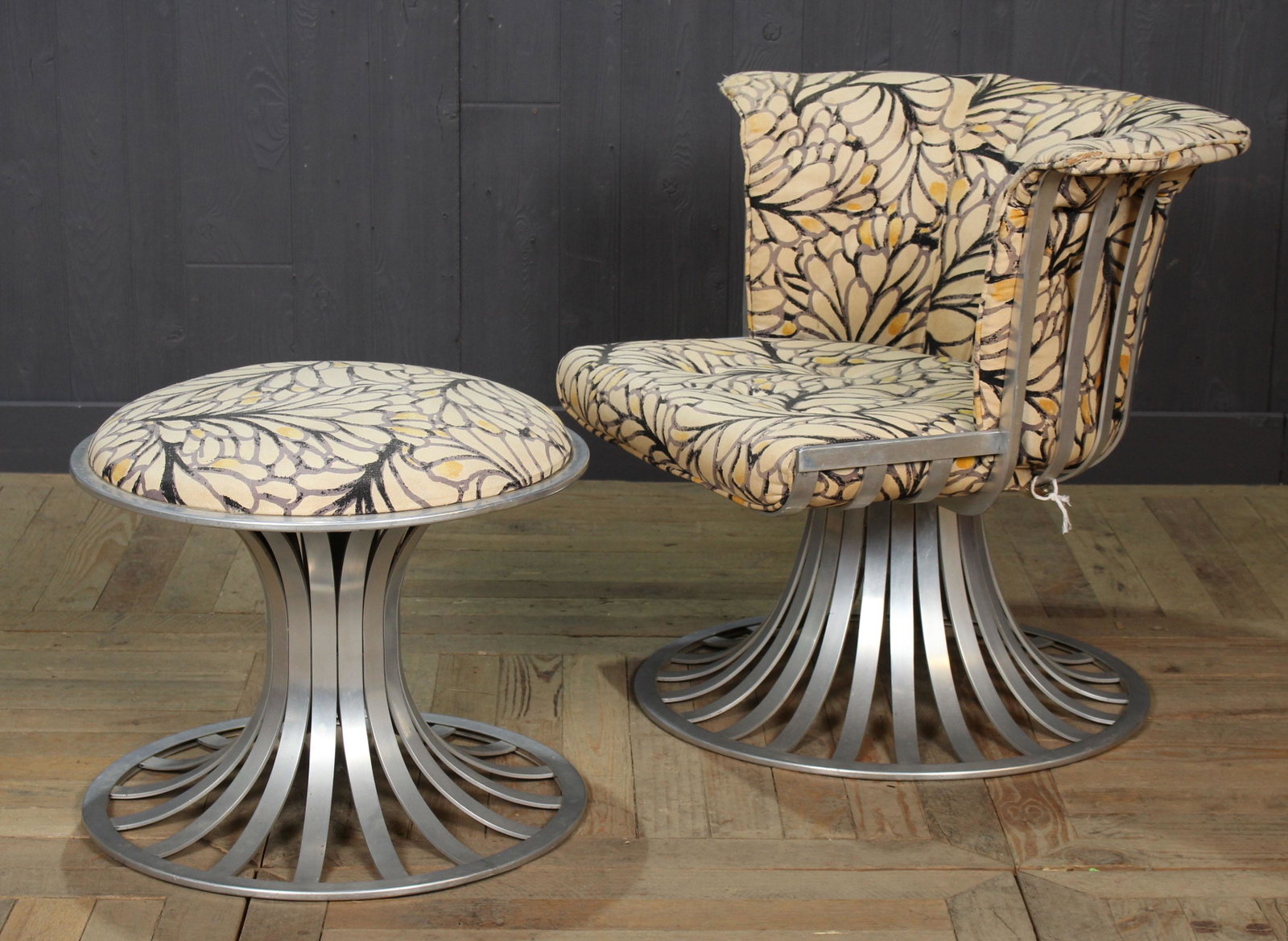 Woodard Chair and Ottoman: Woodard Lounge Chair and Ottoman, designed by Herbert Saiger for Woodard, aluminum, labeled on bottom Lee. L. Woodard. Size: 27" x 33" x 30" chair, 18" x 21" diameter ottoman
