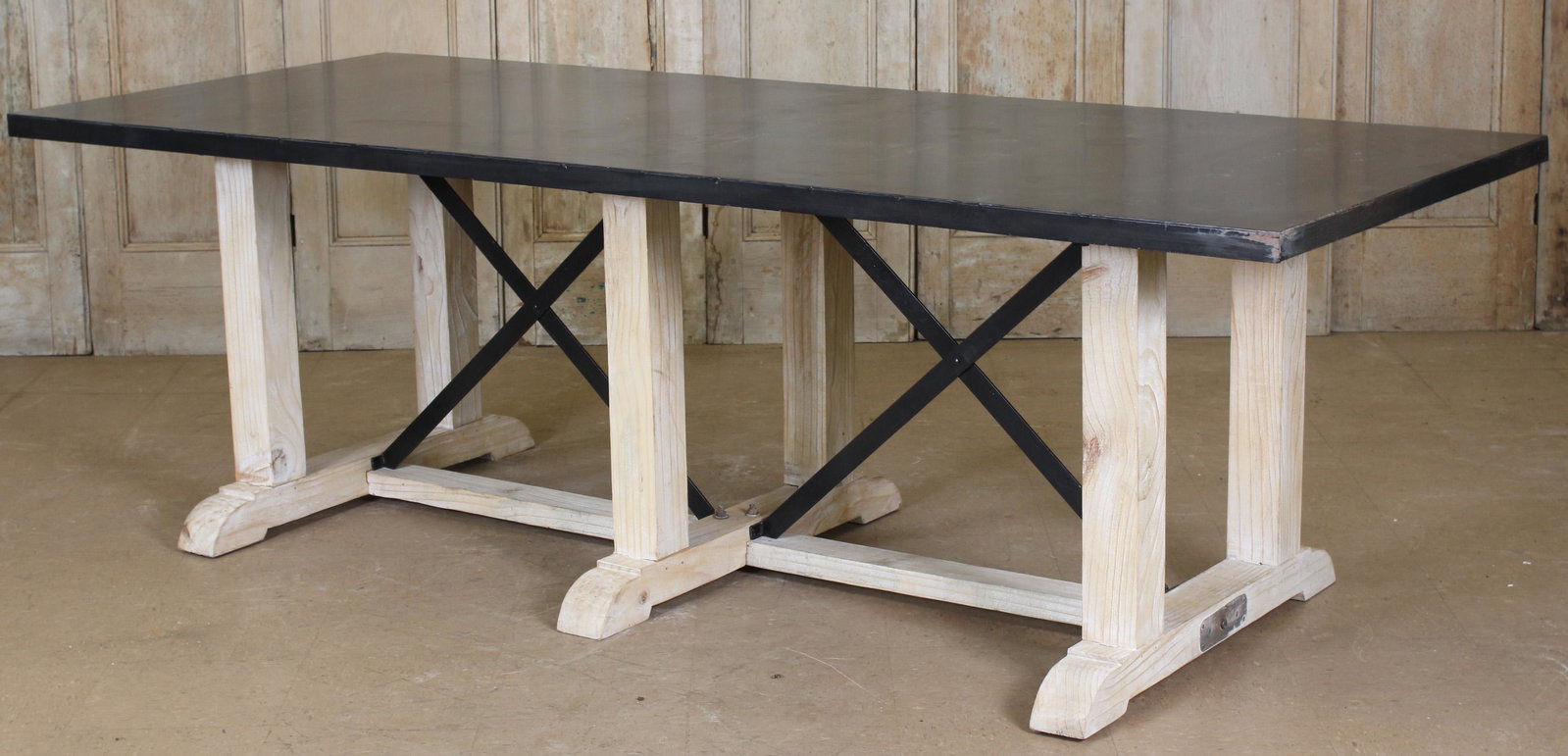 Industrial Top Pine Timber Table: An interesting trestle table having a metal top supported on 6 legs with shoe feet and metal x-form supports. Size: 30.5" H x 96" W x 39" D