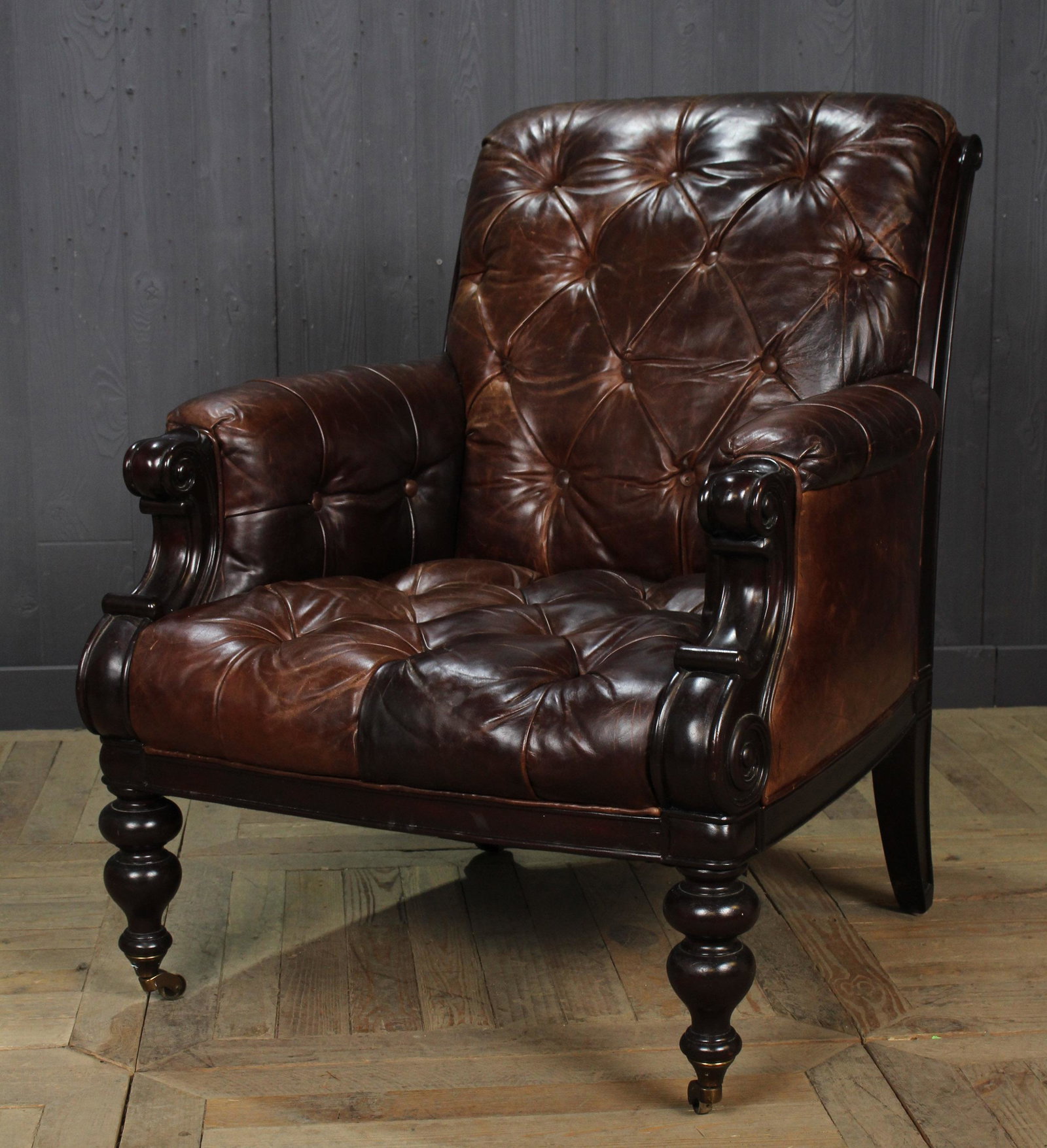 Generously Sized Tufted Leather Club Chair: Generously Sized Tufted Leather Club Chair. Size: 38.5" x 31.5" x 36"