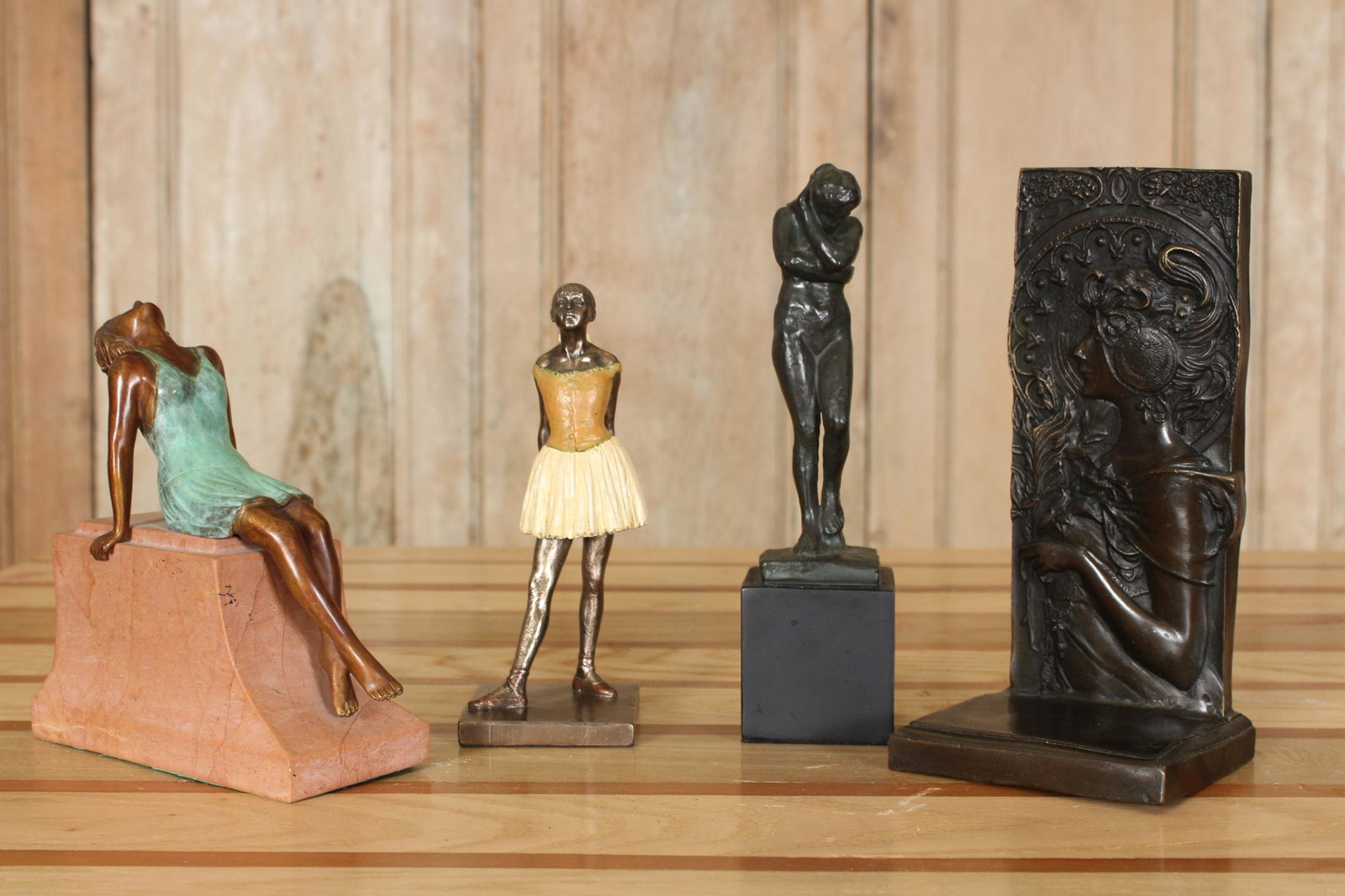 4 Museum Souvenir Figures: 4 Museum Souvenir Figures. Size: 9" H x 4.5" W x 4" D