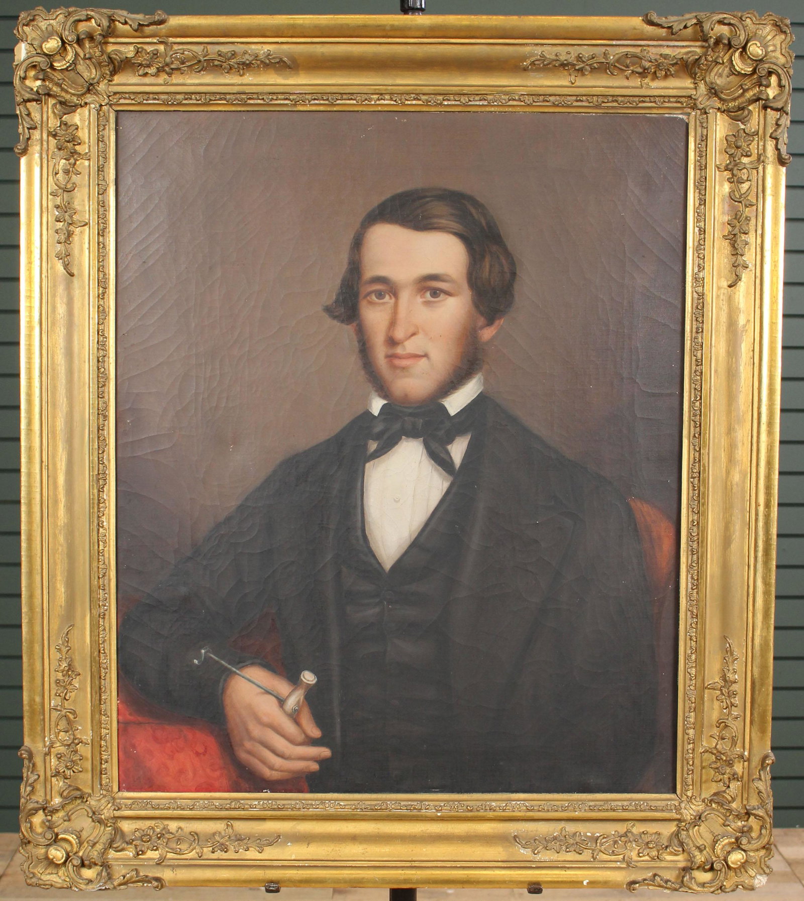 18th C Portrait of a Young Dentist: 18th C Portrait of a Young Dentist. A handsome chap sitting with tooth key in hand. OOC Size: Frame: 36.75"H x 32.5"W Sight: 29.5"H x 24.25"W