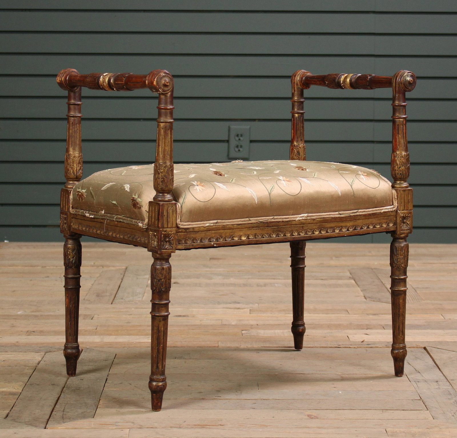 Louis XVI Style Giltwood Carved Bench: Louis XVI Style Gilt Wood Carved Bench having upholstered seat framed by turned arms. Size: 24" H x 24" W x 16" D.