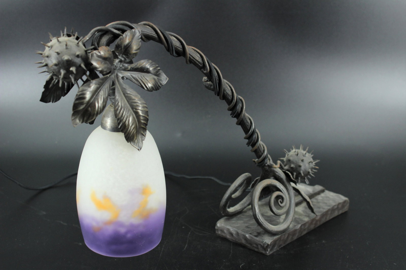 French Art Nouveau L'Elf Piano Lamp: French Art Nouveau L'Elf Signed Art Glass Shade Lamp, wrought iron foliate and scroll design base, signed on shade. Size: 12.5"H x 18.5"W x 4"D