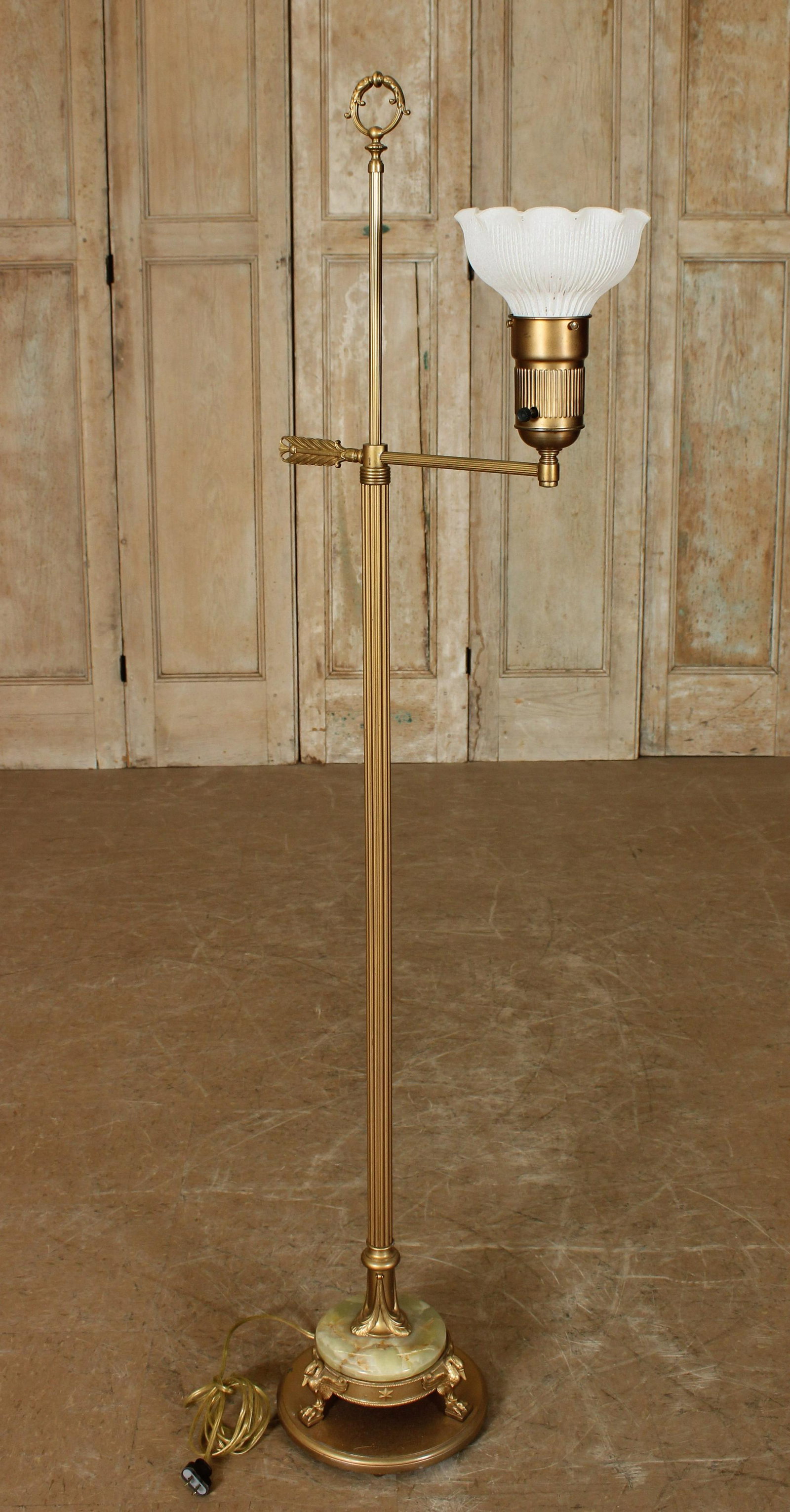 Neoclassical Style Column Form Floor Lamp: Neoclassical Style Column Form Floor Lamp, gilt brass standard, oynx and brass swan triple footed base. 59.5" H x 16" W x 10" D