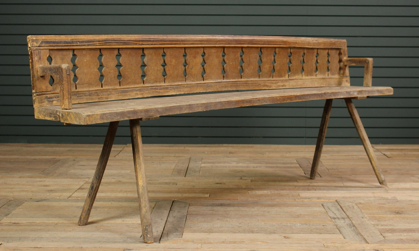 Continental Late 19th C. Carved Wood Bench: Continental Late 19th C. Chalet style Carved Wood Bench having cut out decorated back and plank seat. Size: 30.5" H x 79" W x 12" D.